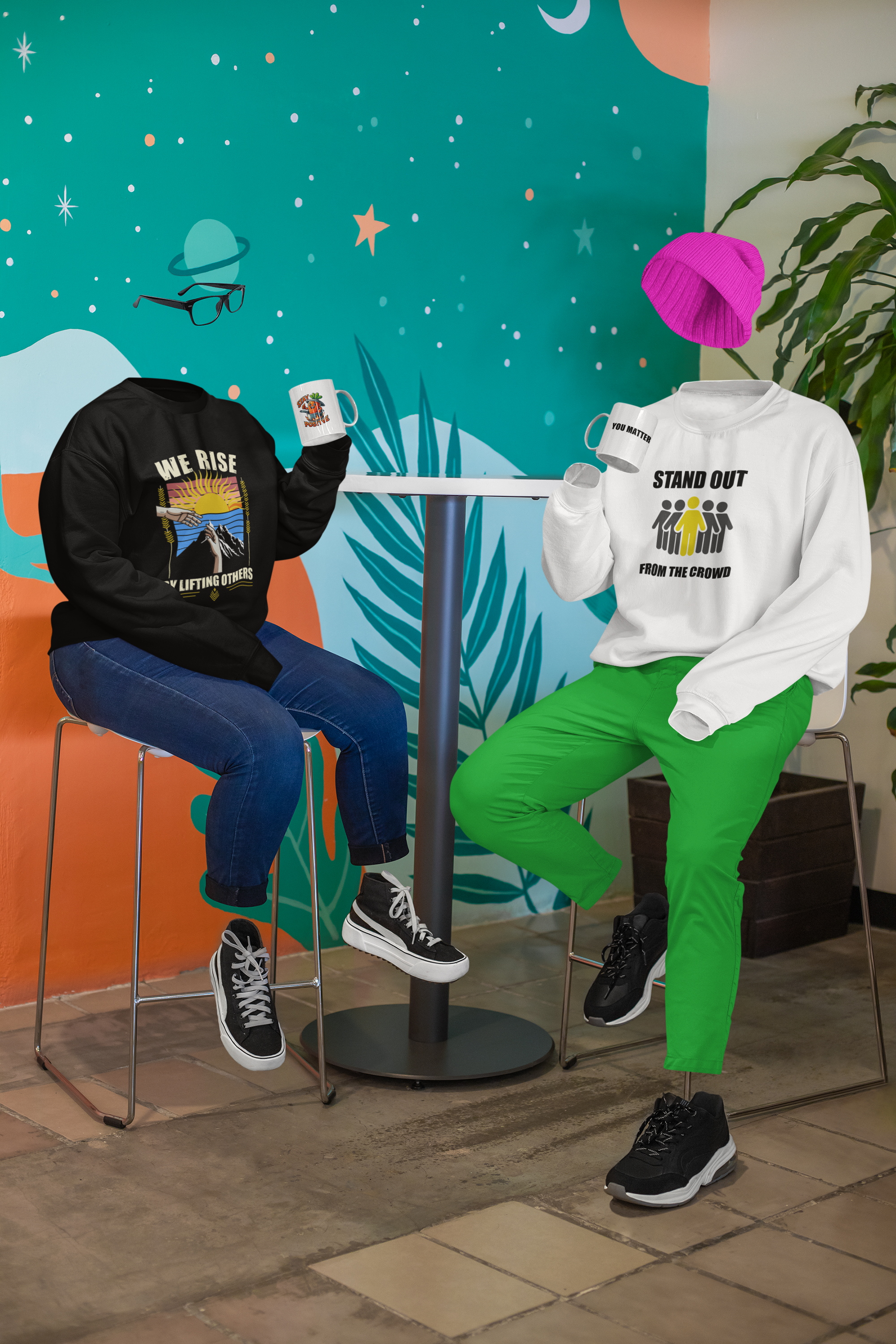 Two headless mannequins sitting on stools at a round table, dressed in casual clothing, with a colorful space-themed mural in the background and a pink knit hat floating above the right mannequin.