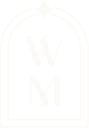 Black rectangular sign with white lettering 'W M' inside a white border