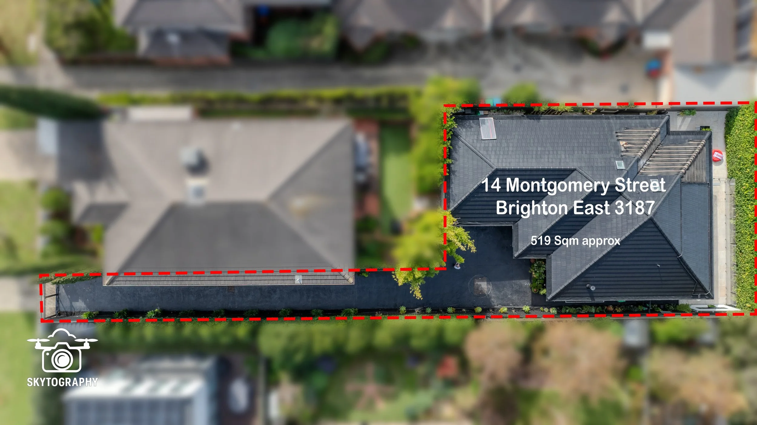 Aerial view of a house on Montgomery Street, Brighton East, with a red dashed line outlining the property boundary. The house has a dark gray roof with a hot tub on top, and the property covers approximately 519 square meters. The image includes greenery, neighboring roofs, and driveways.