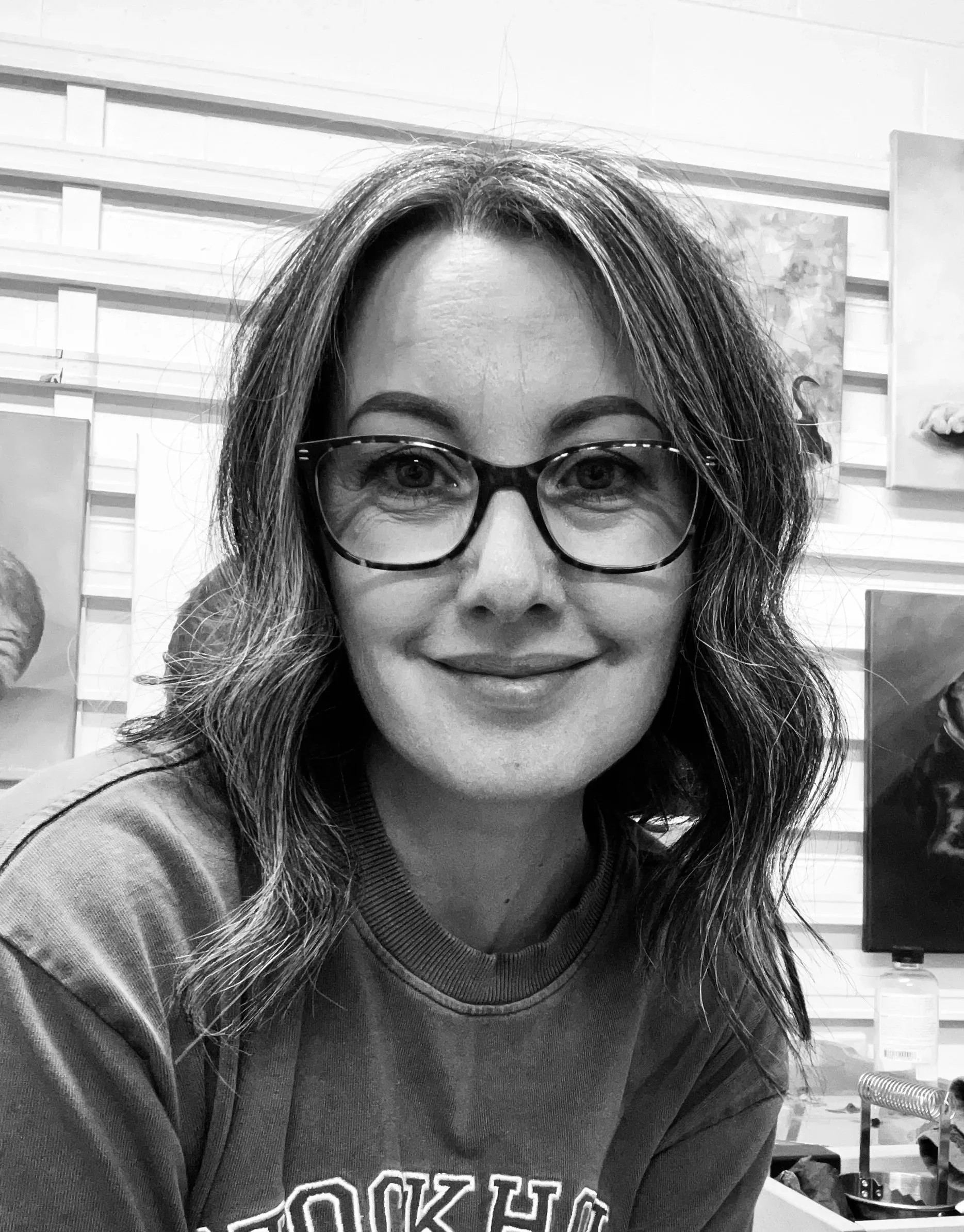 Profile photo of Illustrator Jen Sweeney in her art studio