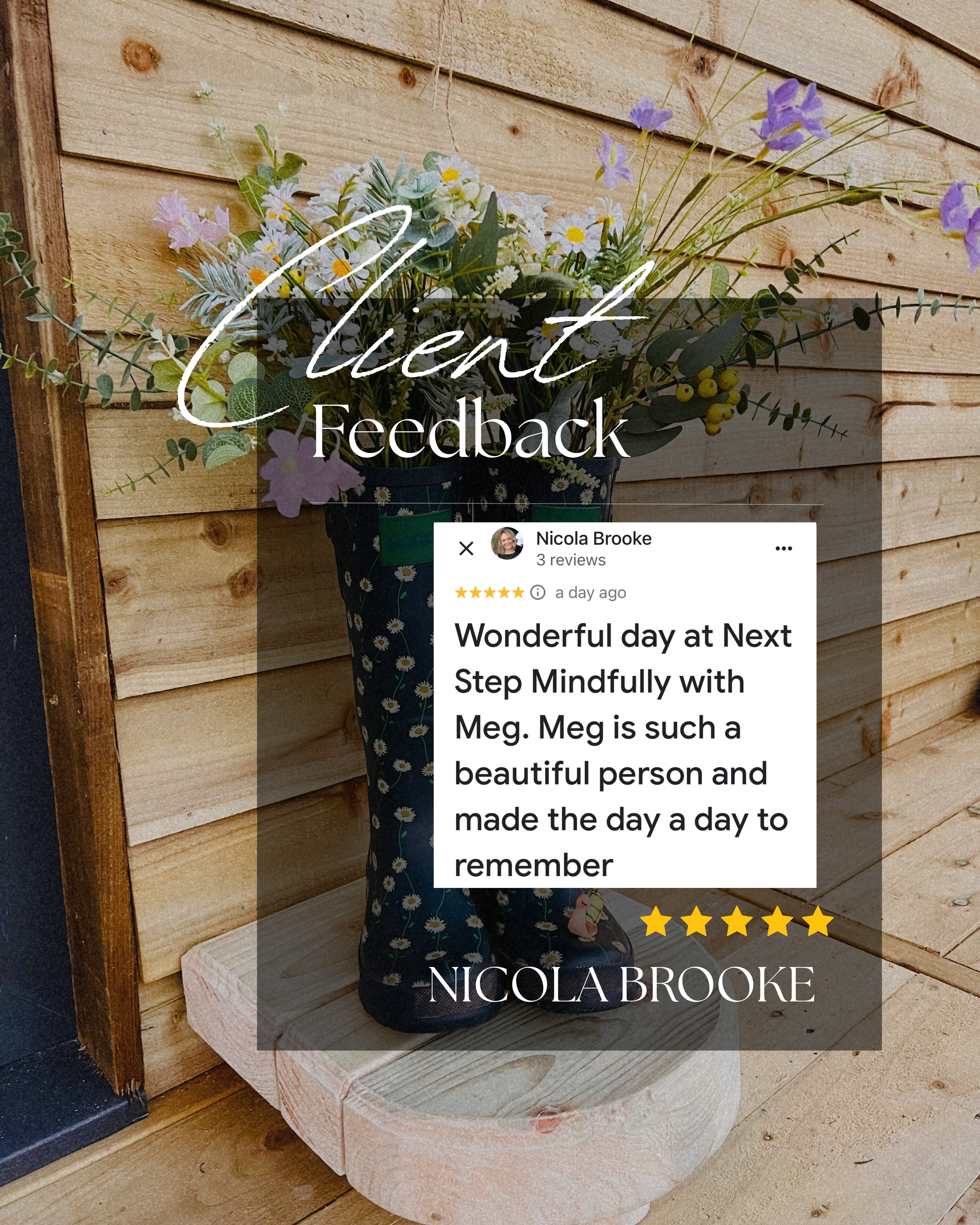 A bouquet of mixed flowers in a black vase with daisy-like white flowers, purple flowers, and green foliage, placed on a wooden surface against a wooden wall background, with overlay text 'Silent Feedback' and a partially visible online review from Nicola Brooke.