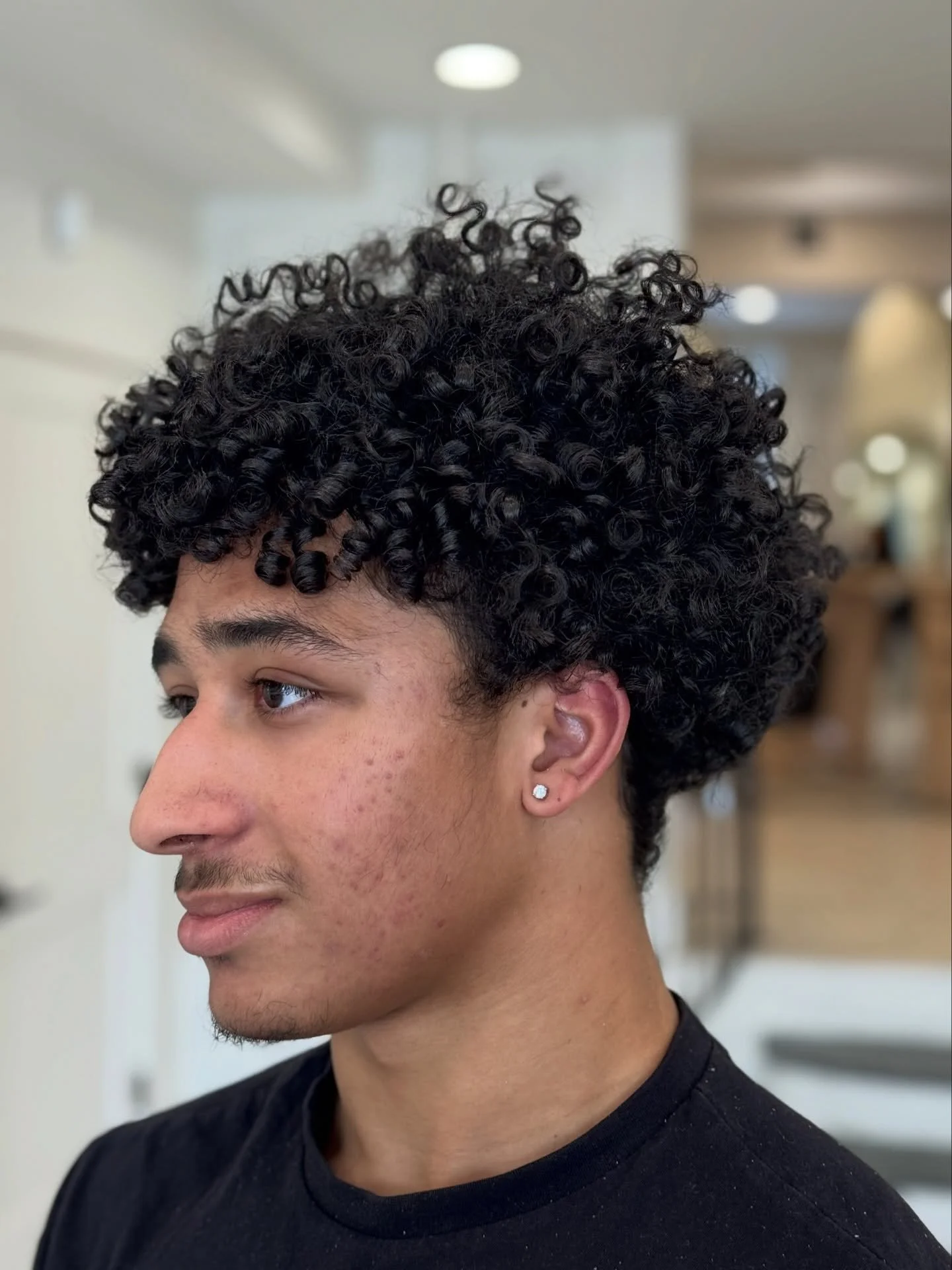 Here&rsquo;s the truth:
If you have curly hair, a curly cut is for you.

This cut was all about creating balance, building height in the right places, and giving him a shape he actually feels confident wearing&mdash;not fighting against.

And just as