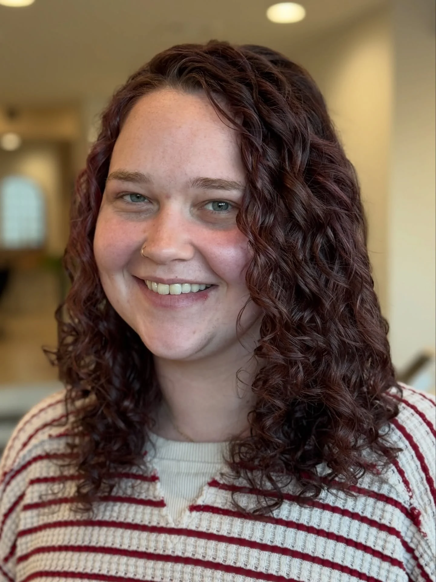 A curly cut should make your life easier.

Not harder.

It should support your curl pattern, create balance throughout the shape, and help your hair fall into place more naturally.

Because when the shape is right, everything else starts to work bett