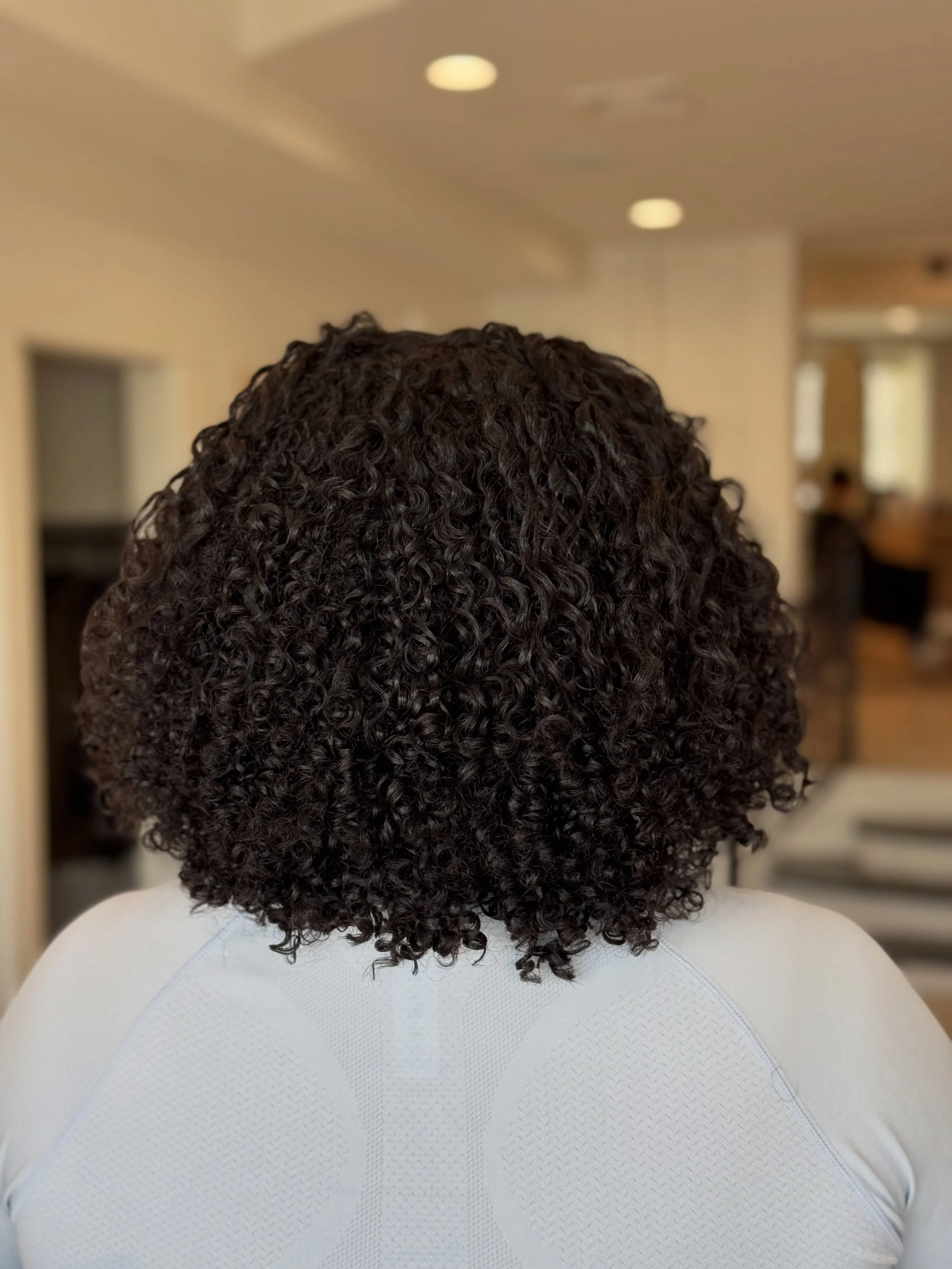 Sometimes your curls don&rsquo;t need more length taken off&hellip; they need balance restored.

This corrective curly cut was all about reshaping the silhouette, removing weight in the right places, and creating intentional layers so her curls could