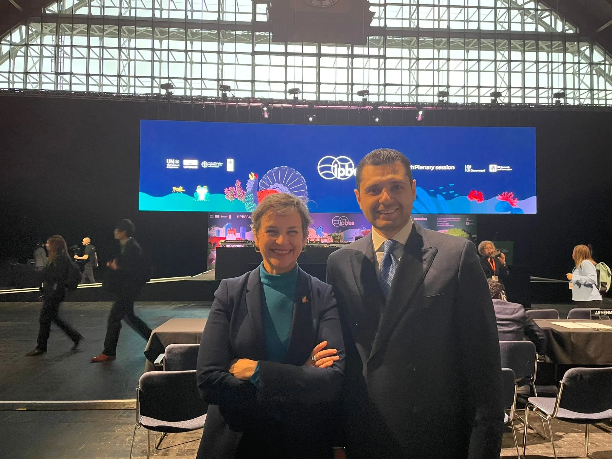 Mary smiling with suited man.jpeg