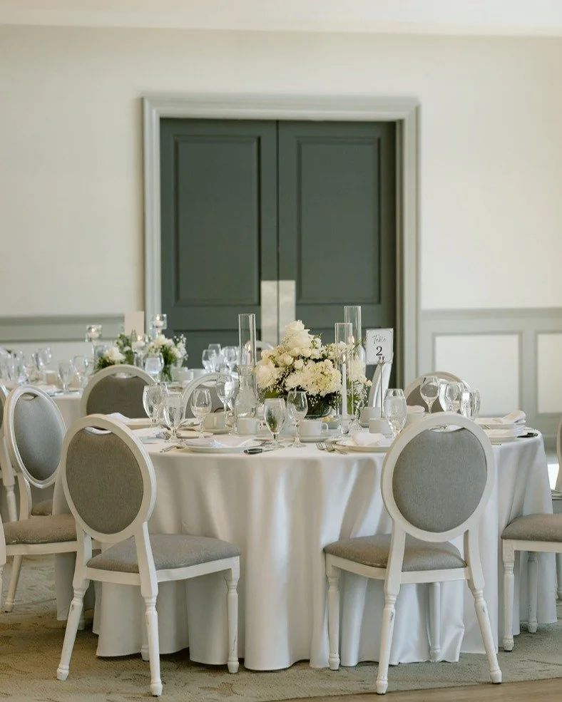 Simple and elegant centerpiece in clear compote surrounded with multi height tapered candles for C &amp; J's wedding at Deer Creek. 

#TorontoWeddings&nbsp;#LuxuryWeddingsToronto&nbsp;#HighEndWeddings&nbsp;#TorontoBrides
#TorontoEventPlanners&nbsp;#L