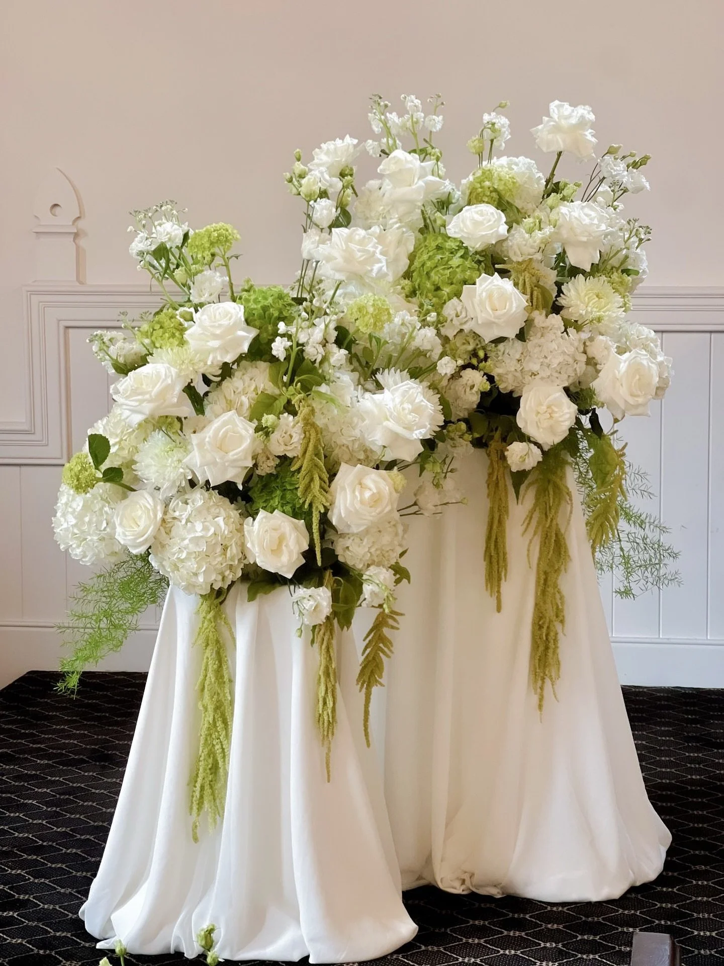 A &amp; K's Ceremony backdrop with drapery and a deconstructed lomey plate arrangement in green amaranthus white and green hydrangea, and flexed roses to complete the look.

#torontoflorist&nbsp;#weddingsintoronto&nbsp;#weddingtrends2025&nbsp;#blusha