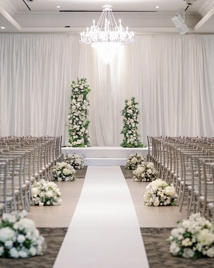 Deconstructed Arch in white and green florals with lomey plate arrangements that lines the aisle. 

Plan your dream wedding with us. 
We're booking 2026-2027 Weddings now.

#TorontoWeddings&nbsp;#LuxuryWeddingsToronto&nbsp;#HighEndWeddings&nbsp;#Toro