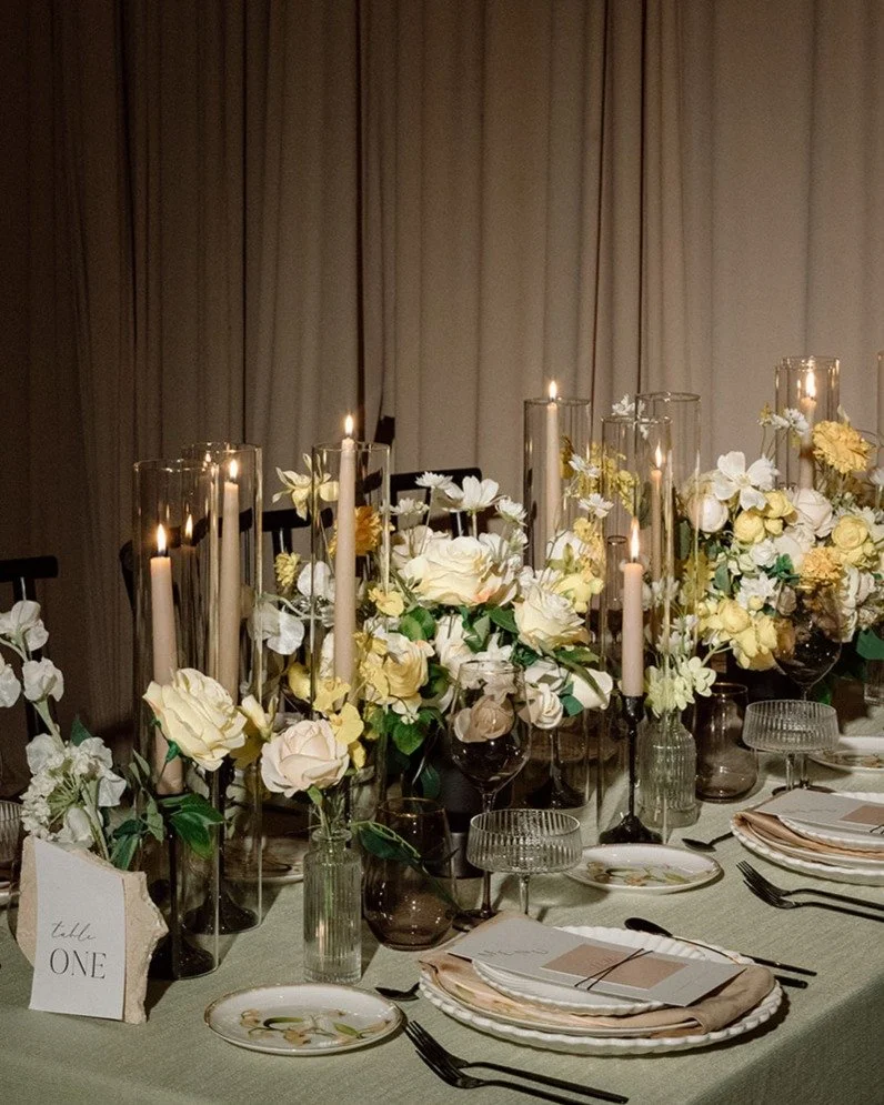Centerpieces for rectangular tables and tapered candles to compliment it. 

Planning and Design: @claudiaandco_
Decor rentals: @special_event_rentals
Florals: @bloomberry.and.co
Photography : @paulavisco