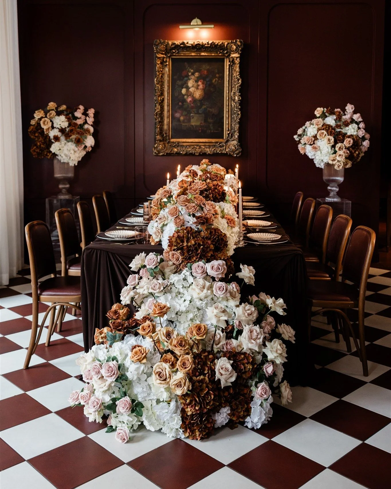Set in a Parisian-inspired bistro, the scene unfolds in a palette of rich browns, creamy neutrals, and golden tones. Lush florals in velvety textures cascade across the table, inviting guests in a setting that feels both opulent and intimate, like a 