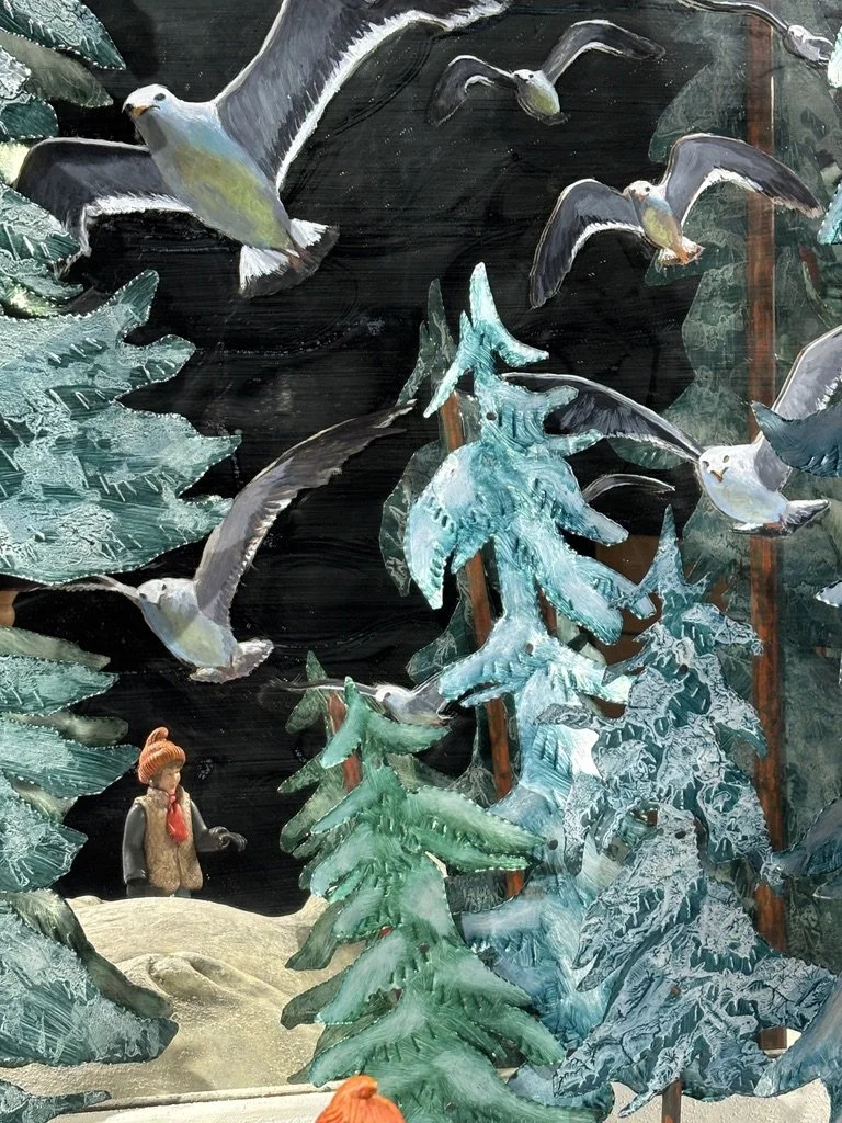 Portrait of the Seagull's Keeper, detail with mirror, metal and wood trees, reflection of figure