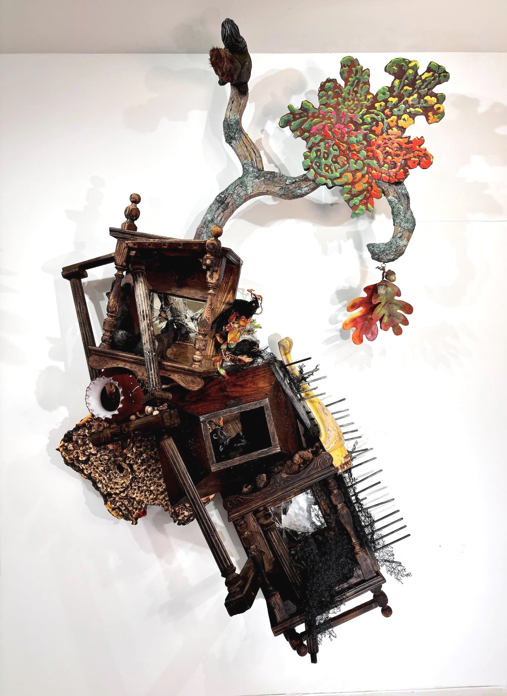 Come Time for Dying and Setting Stores, 2025
wall assemblage (wood furniture parts, glass, mirror, found Styrofoam, metal, feathers, plastic animals, paint, cardboard, paper mache, plastic mesh, shells, dried flora, and fur)
75.5" x 44" x 14.5"
