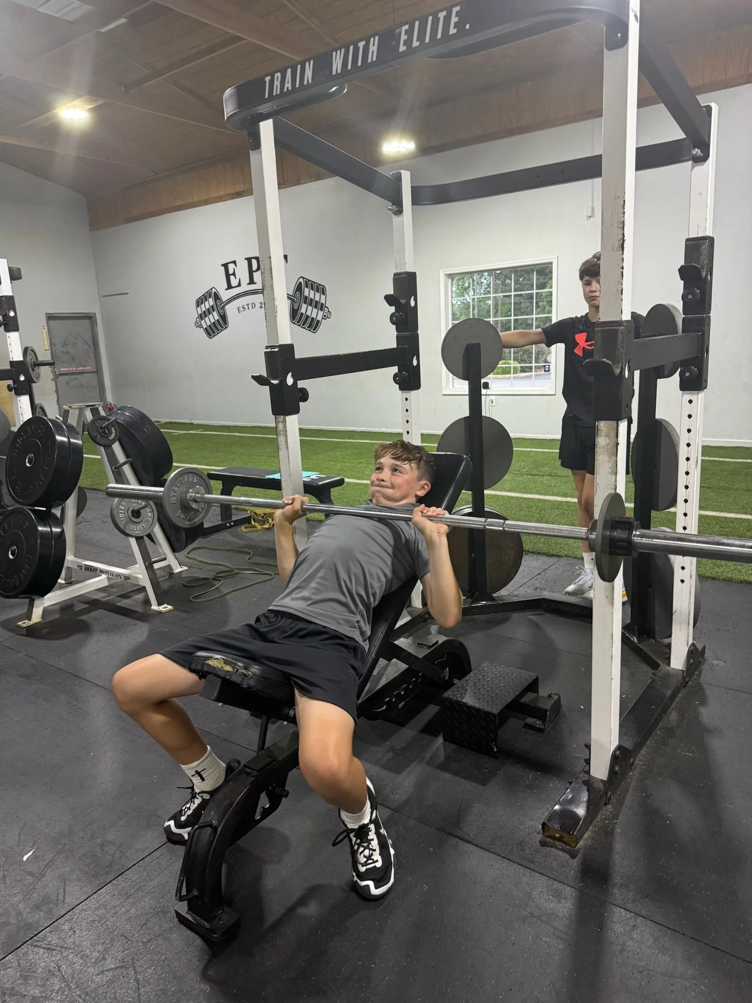 Bench pressing with an EPT athlete.