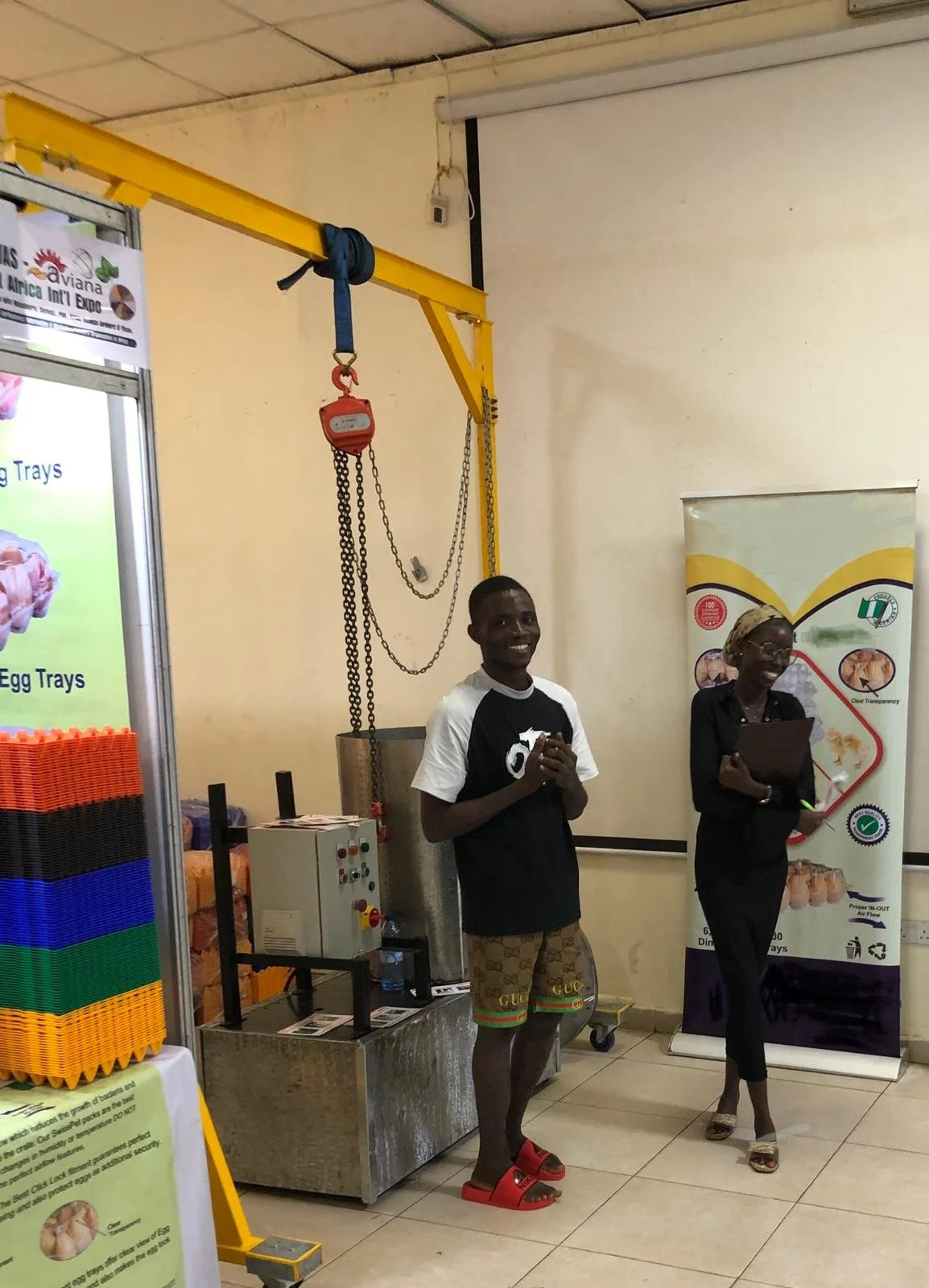 Smiling staff at ECOWAS Balbus stand.jpg