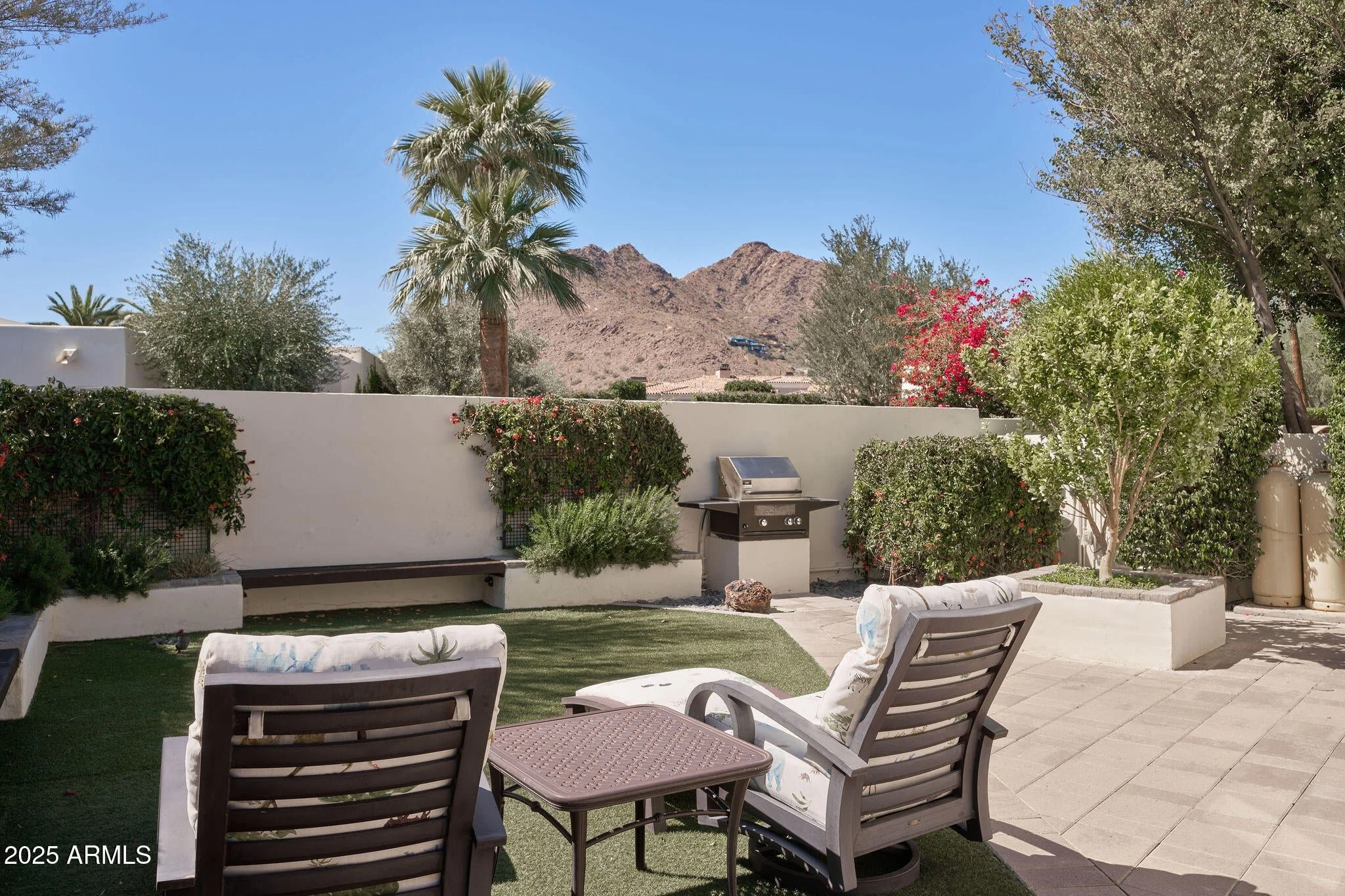 Indoor/Outdoor living with open concept and camelback views