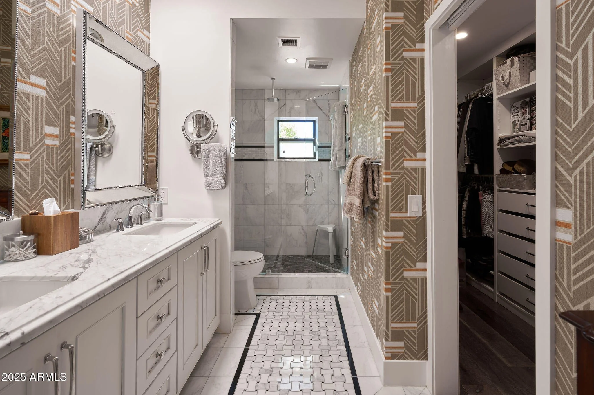 Primary bath in paradise valley with custom wall paper and dual vanity sinks
