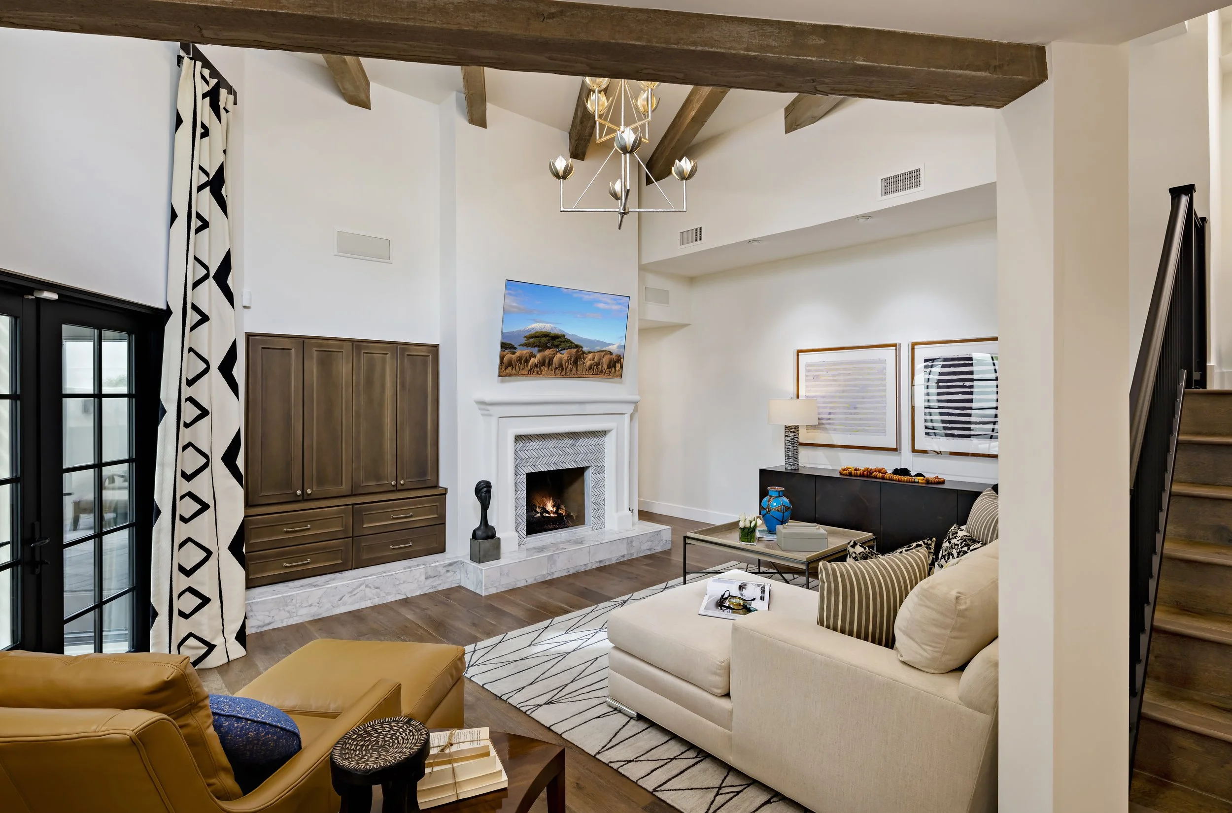 Warm family room with custom millwork and desert-inspired palette in Casa Blanca