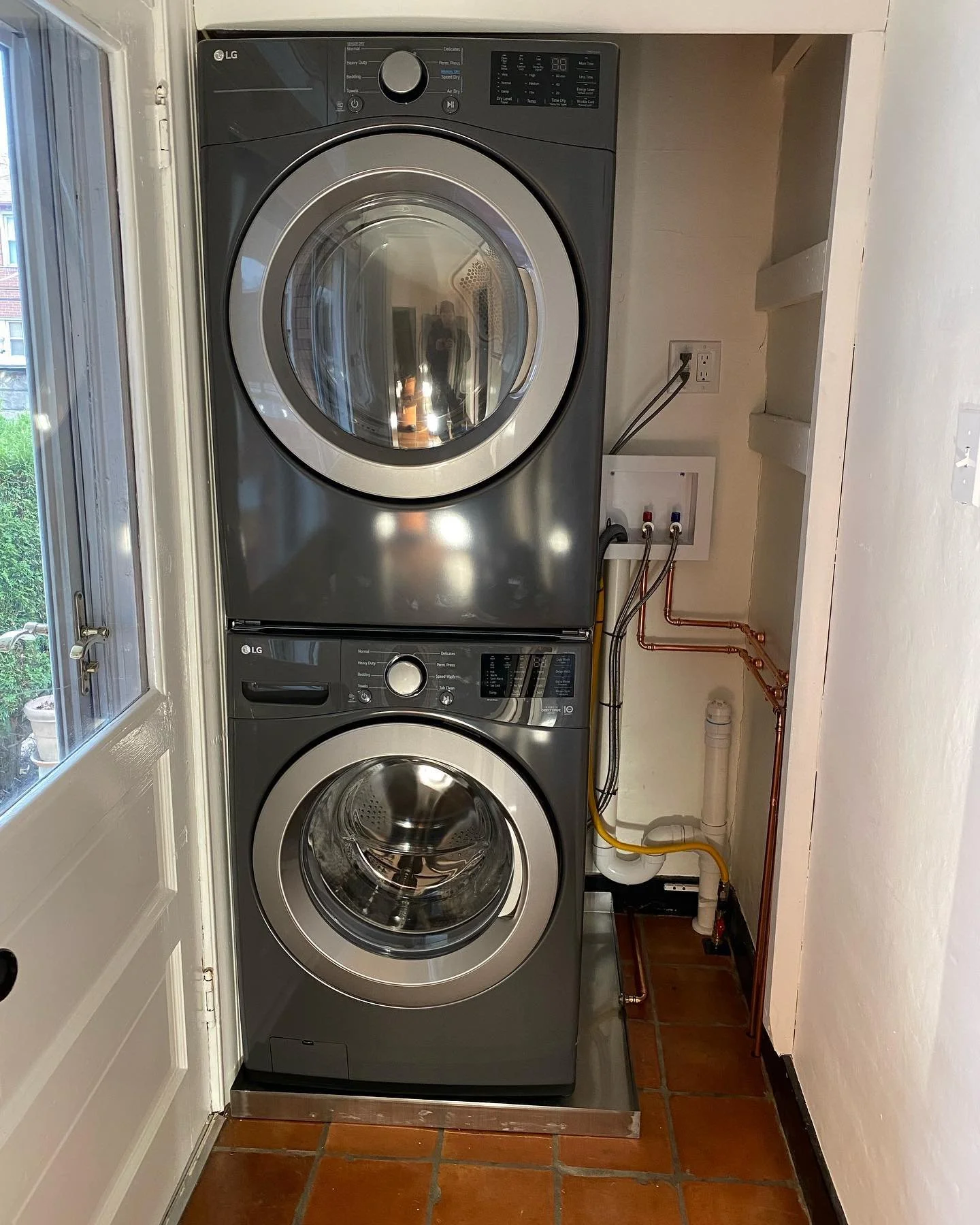 Added this first floor laundry the other day in a little pantry space. There should always be an emergency drain pan for *when* the washer leaks to prevent flooding of the house. Since this portion of the house is over a crawlspace, we brought the wa