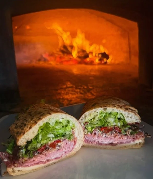From @cafeenza: Check the stack on this Sammy!

You tried our Italian Panuozzo? This baby&rsquo;s got Soppressata salami, smoked ham, provolone cheese, red onion, Mama Lil&rsquo;s peppers, lettuce, house-made mayo finished with pecorino, oregano, and