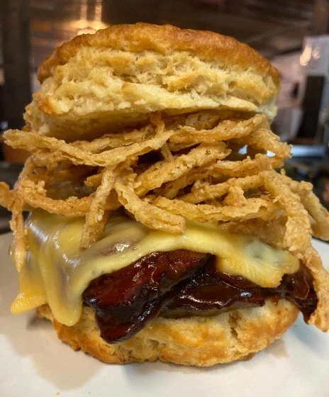 @baselinebiscuits Oh Man! Get this while you can! This monster biscuit sandwich features smoked tri-tip on a fluffy biscuit topped with smoked cheddar and fried onions.

Available today! (Monday)

#baselinebiscuits
#parkdaleoregon
#hoodrivereats