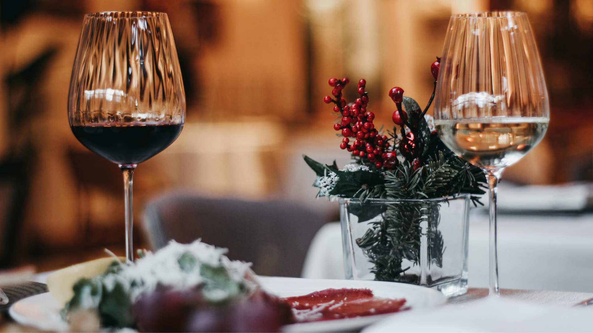 Dining table with food and wine