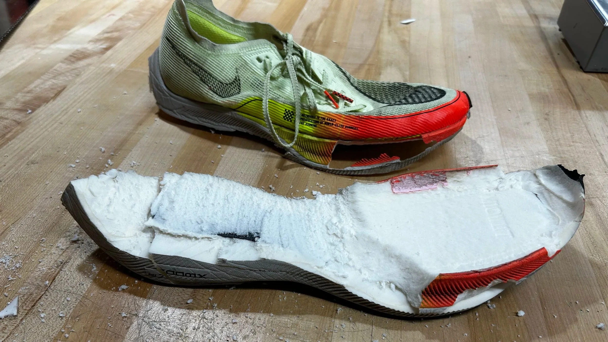 (2) Product teardown - foam and plate removed from the original shoe.
