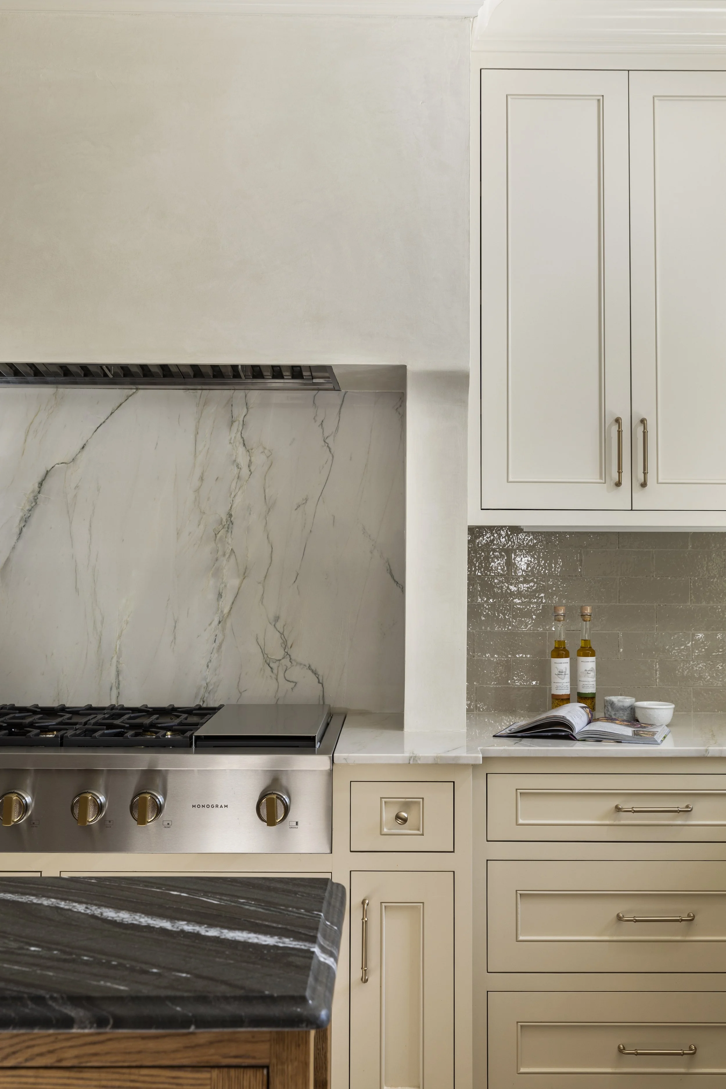 Houston design firm Paula Dixon Design creates custom plaster vent hood. 