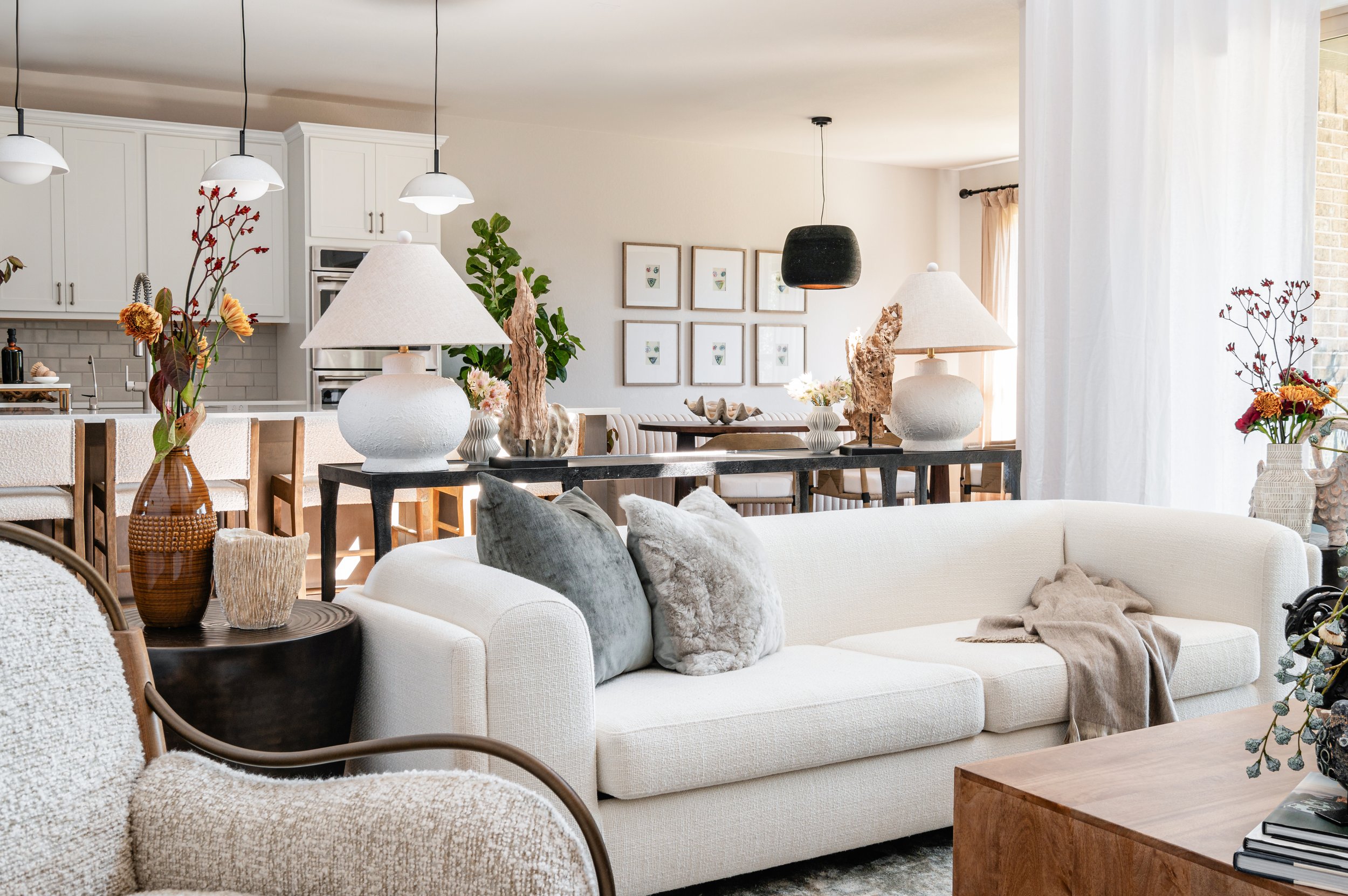 serene living room space with white couch and soft accents