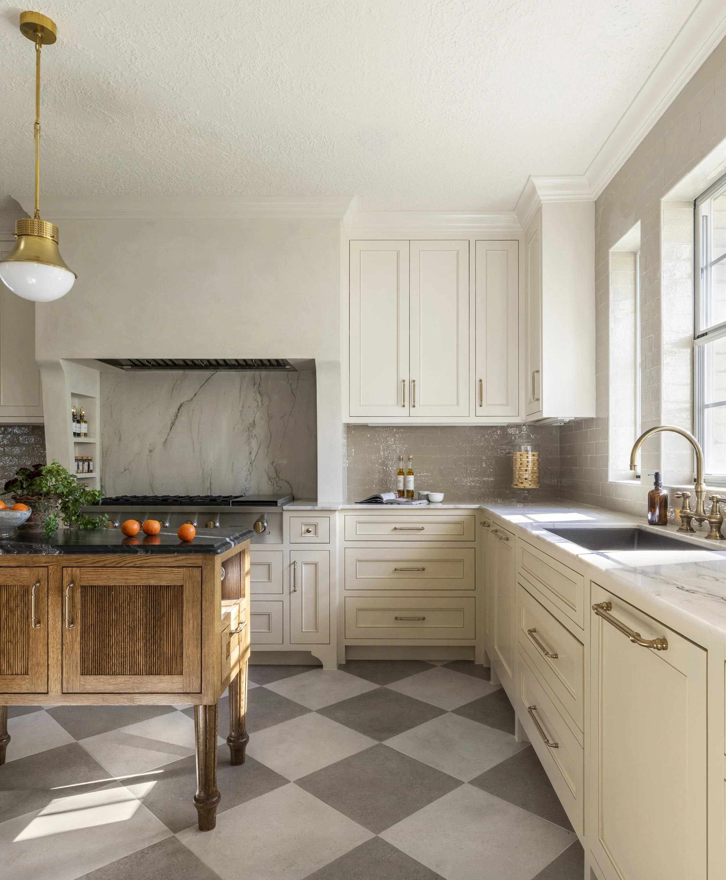 Carefully crafted plaster vent hood designed by Houston design firm Paula Dixon Design. 