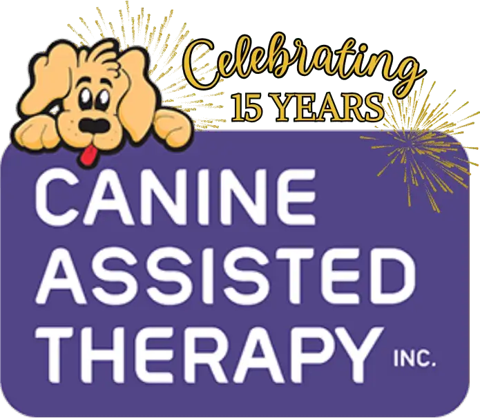 A graphic celebrating 15 years of Canine Assisted Therapy Inc., featuring a cartoon dog with floppy ears, a black nose, and a red tongue, with cheerful yellow and purple fireworks in the background.