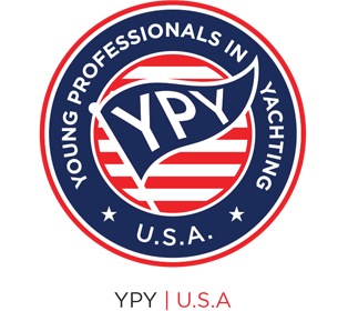 Logo for Young Professionals in Yachting USA (YPY), featuring a circular design with navy blue and red colors, centered text, and American flag elements.