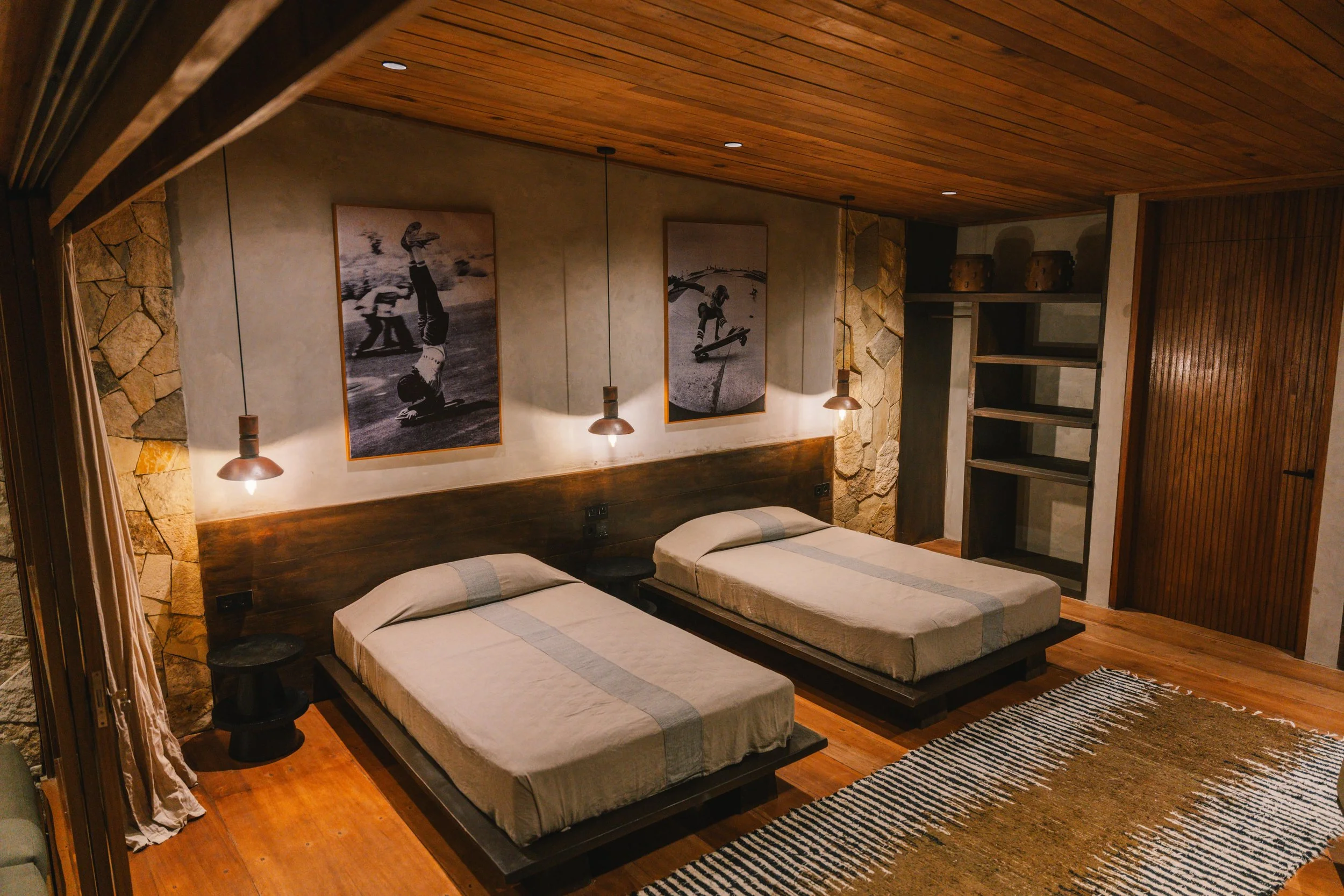 Villa bedroom with tropical décor at La Isla Mentawai