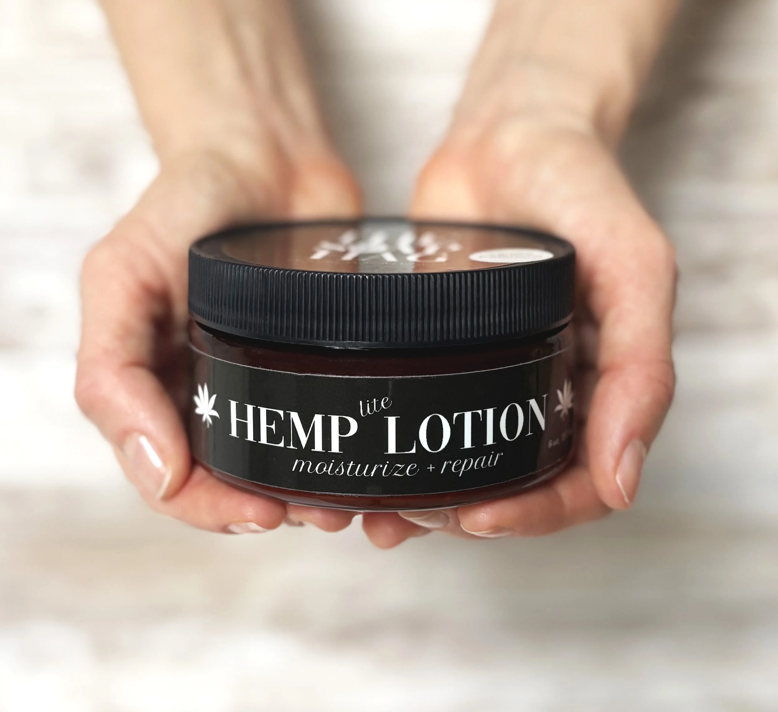 Hemp lotion in hands.jpg