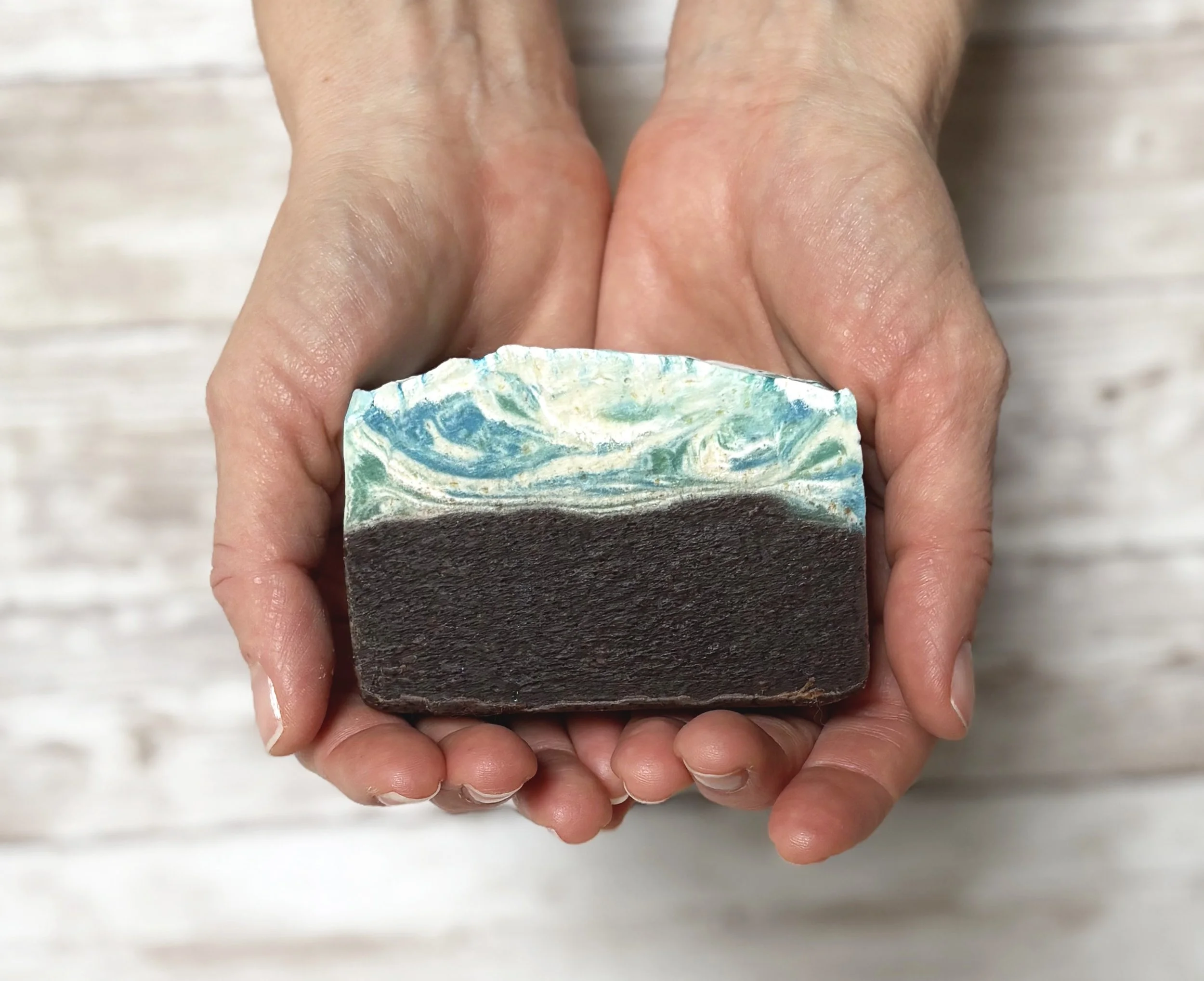 Maine blueberry soap in hands.jpg