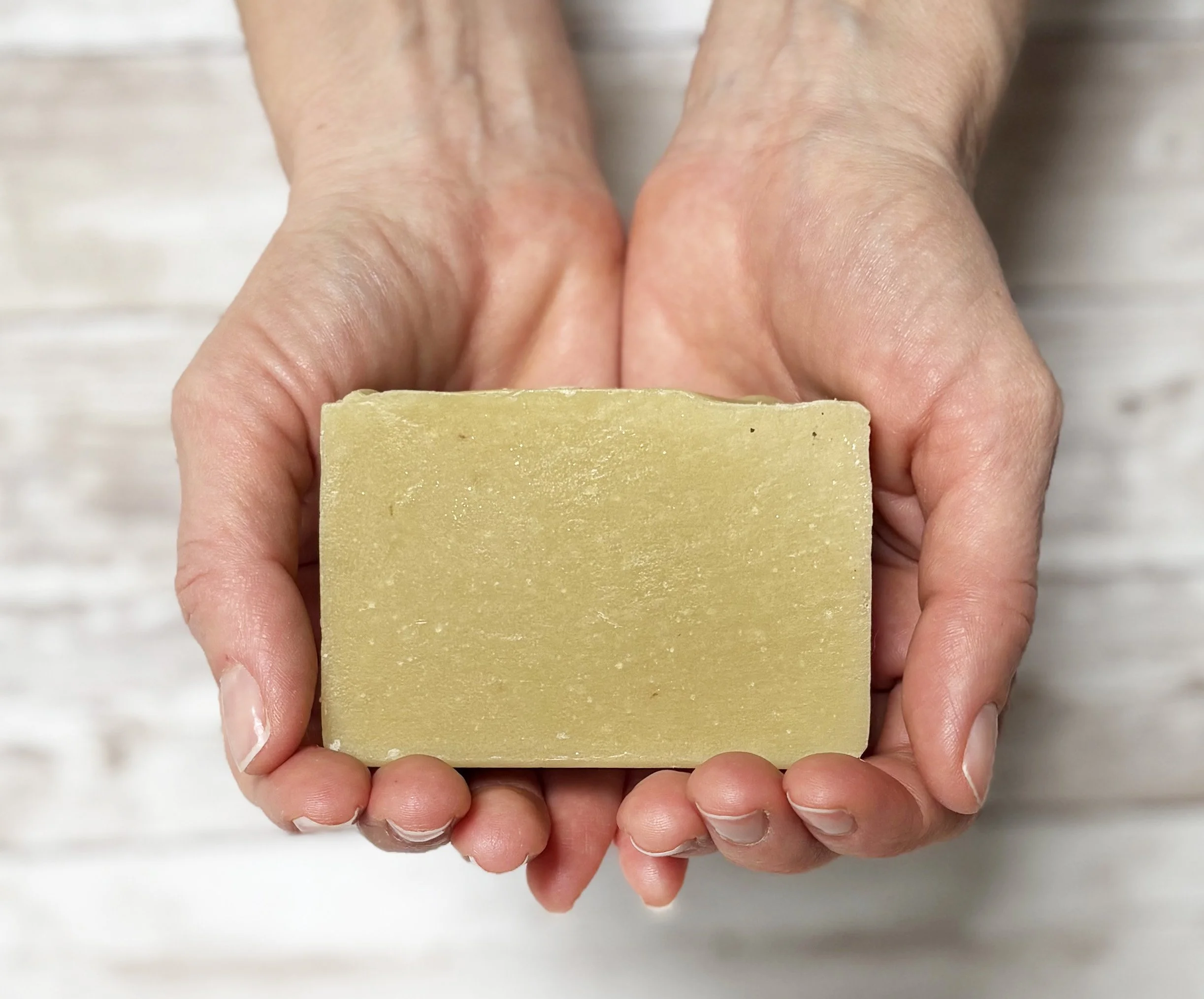 Happy hemp soap in hands.jpg