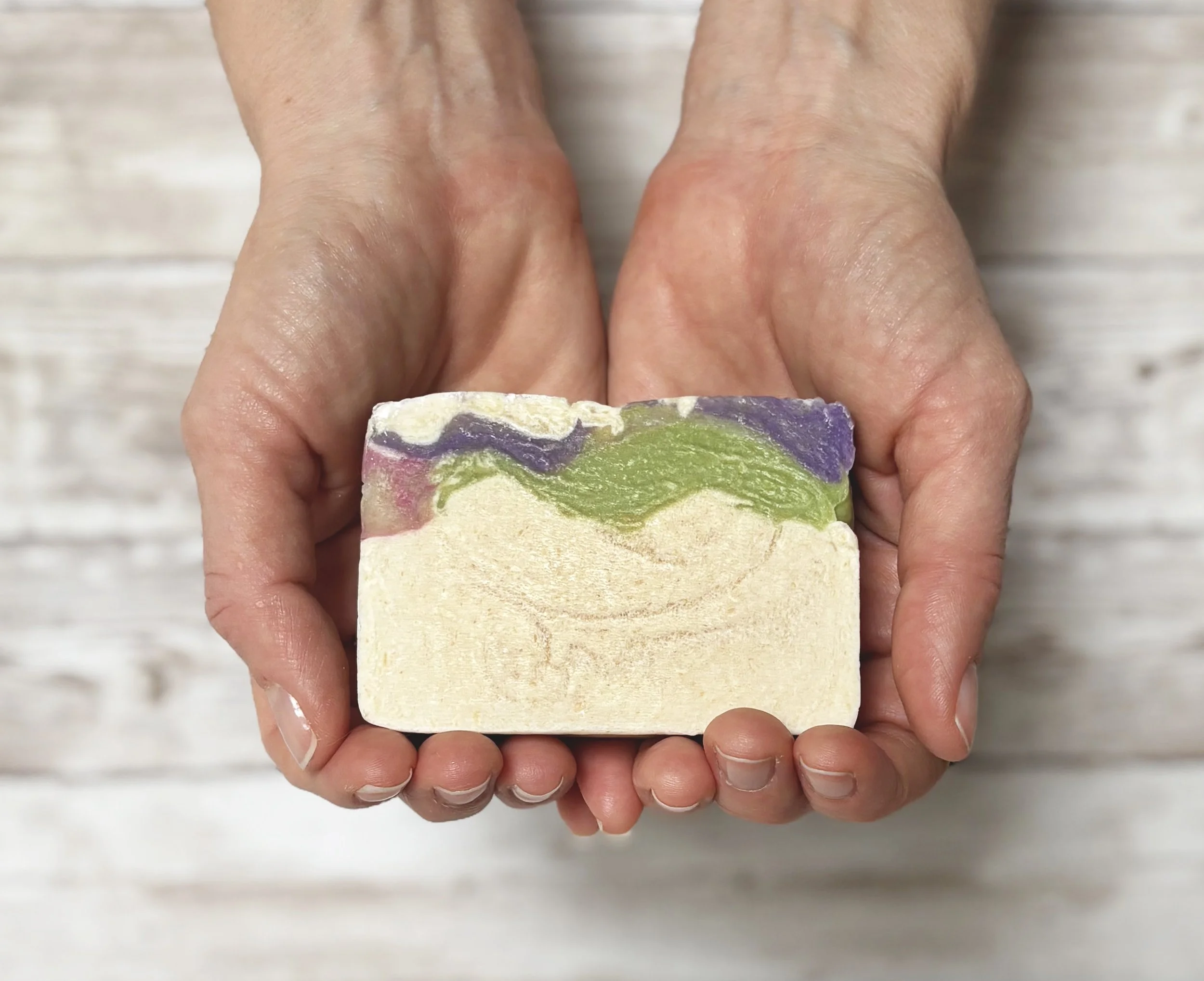 White gardenia soap in hands.jpg