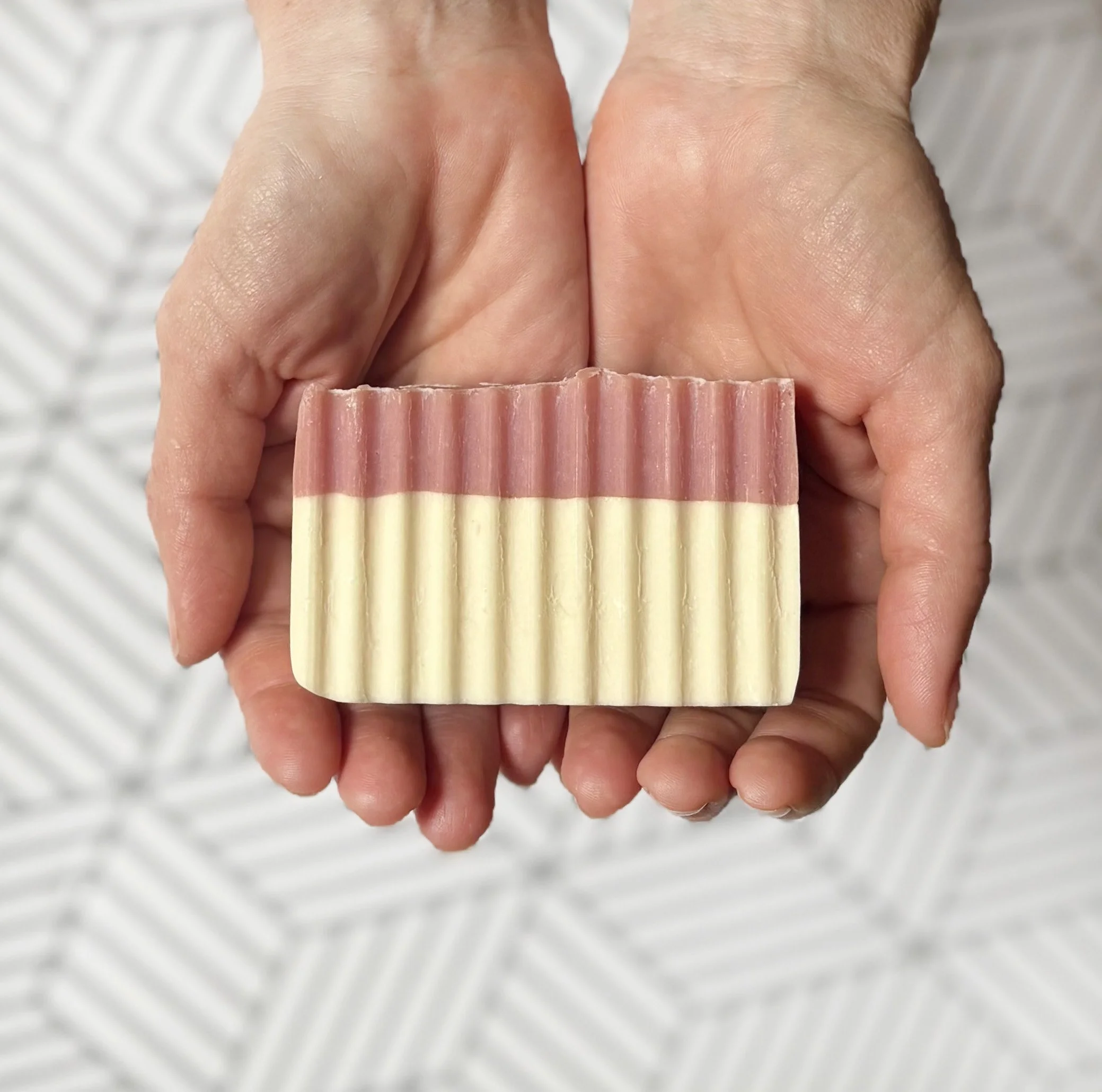 Patchouli Rose soap in hands.jpg