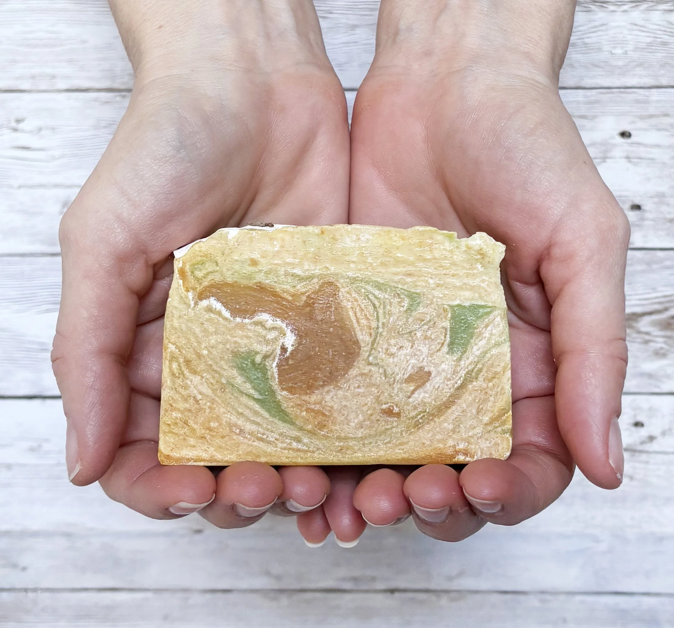 Laneder and lemongrass soap in hands.jpg