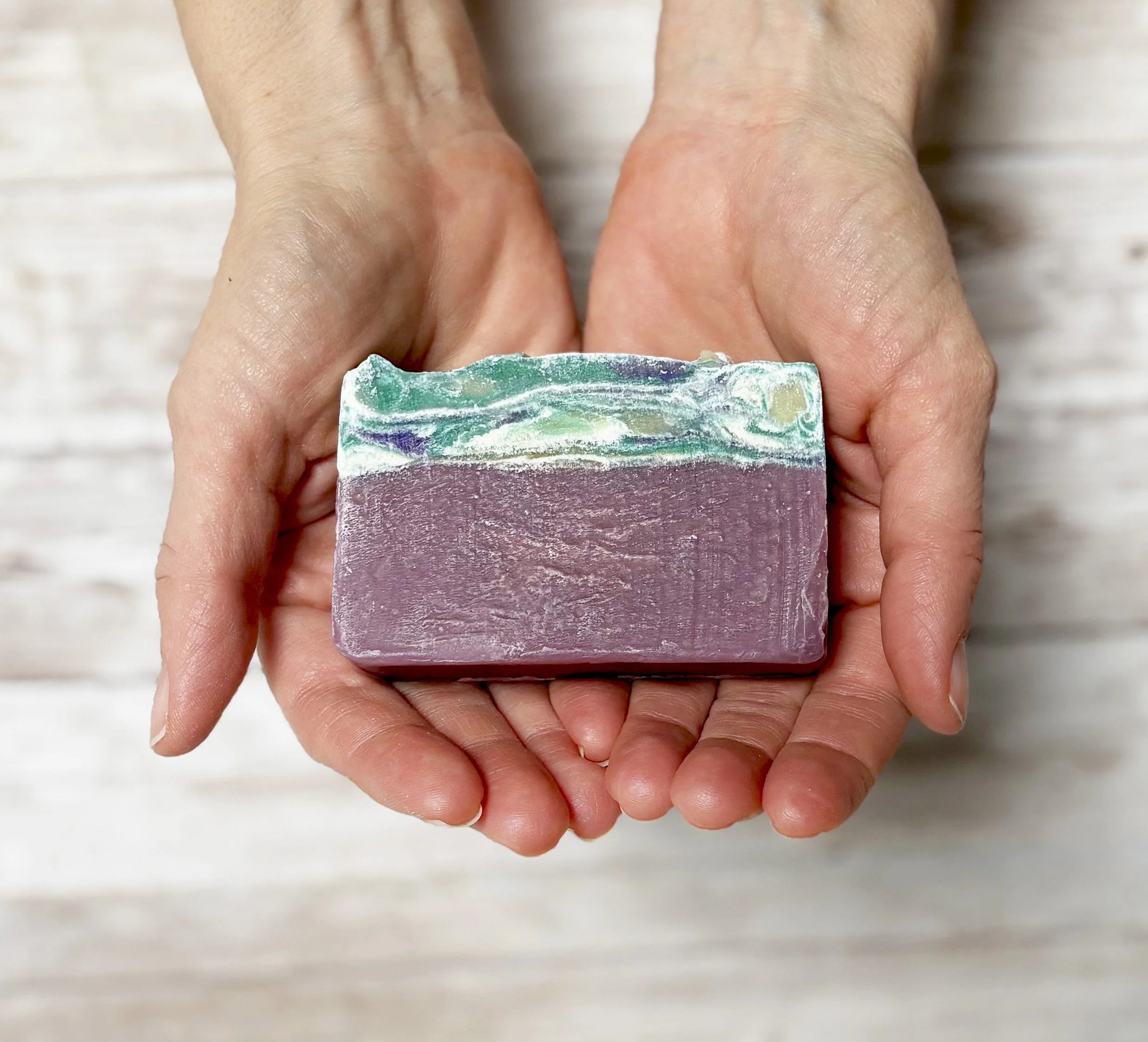 Mulberry spice soap in hands.jpg