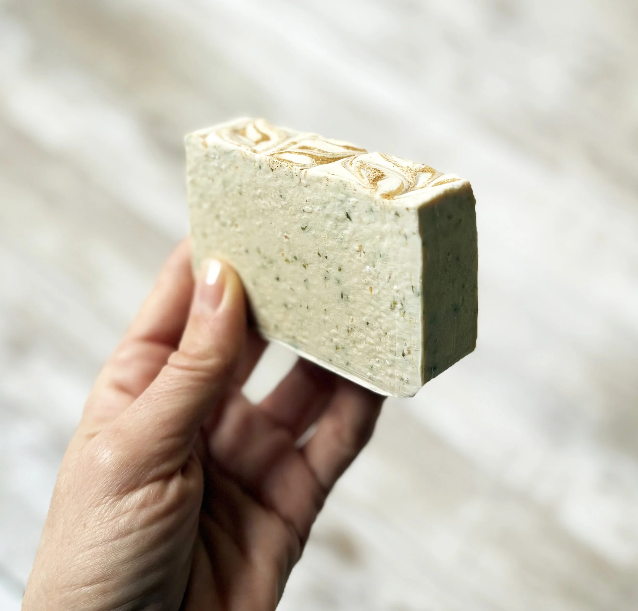 Whit tea and ginger soap in hand.jpg