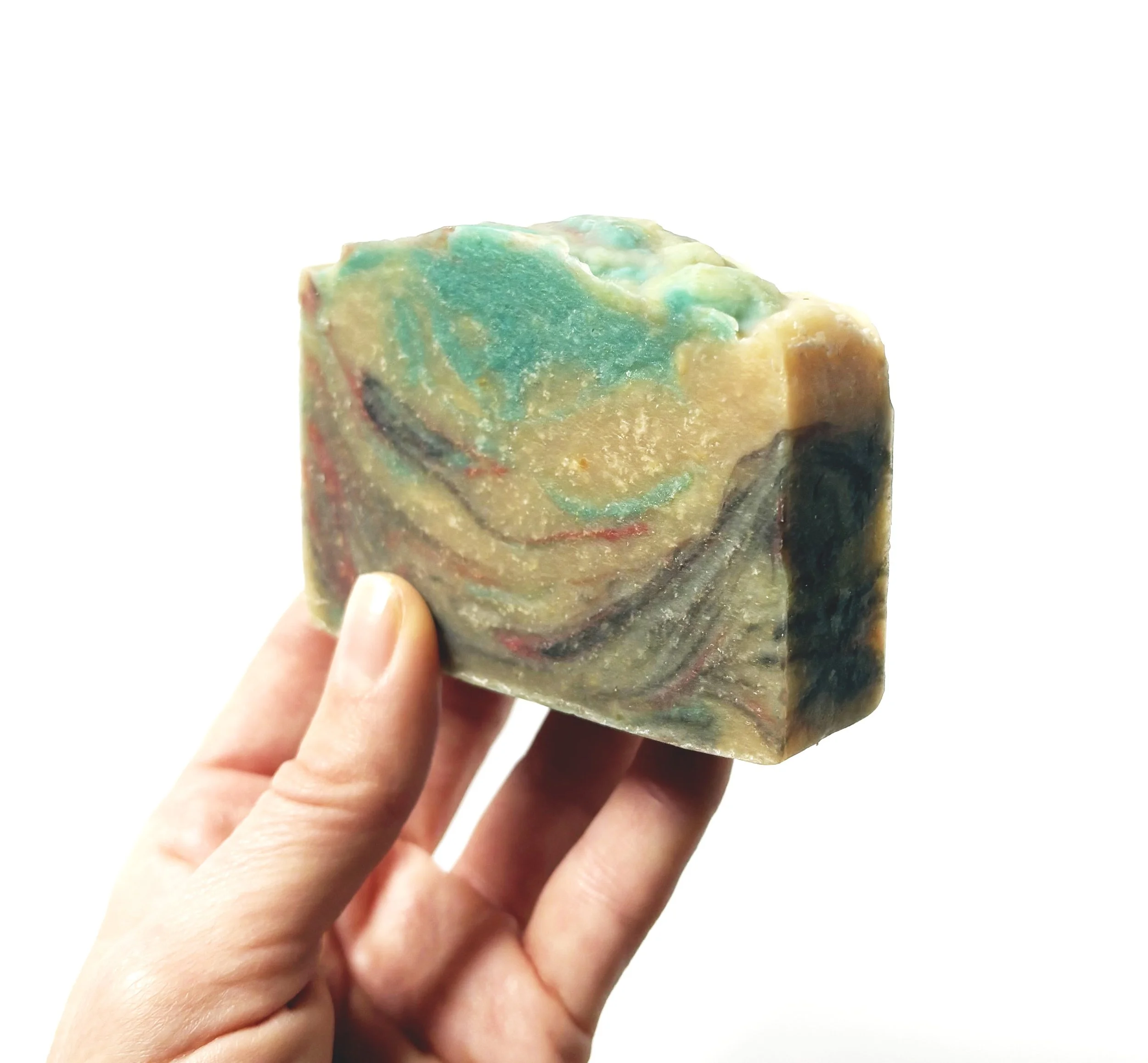 Mountain Cedarwood soap in hand.jpg