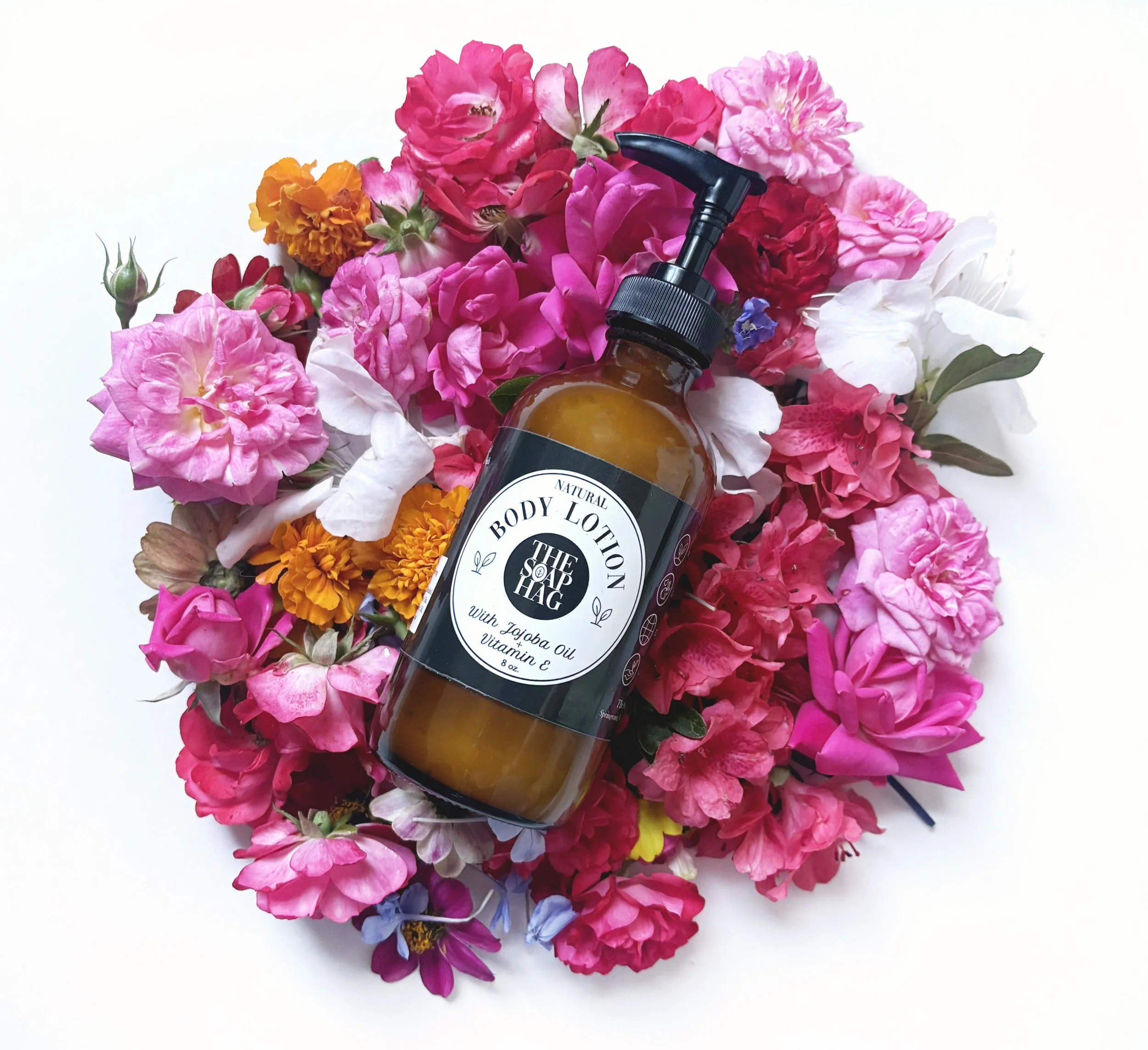 Natural body lotion on flowers.jpg