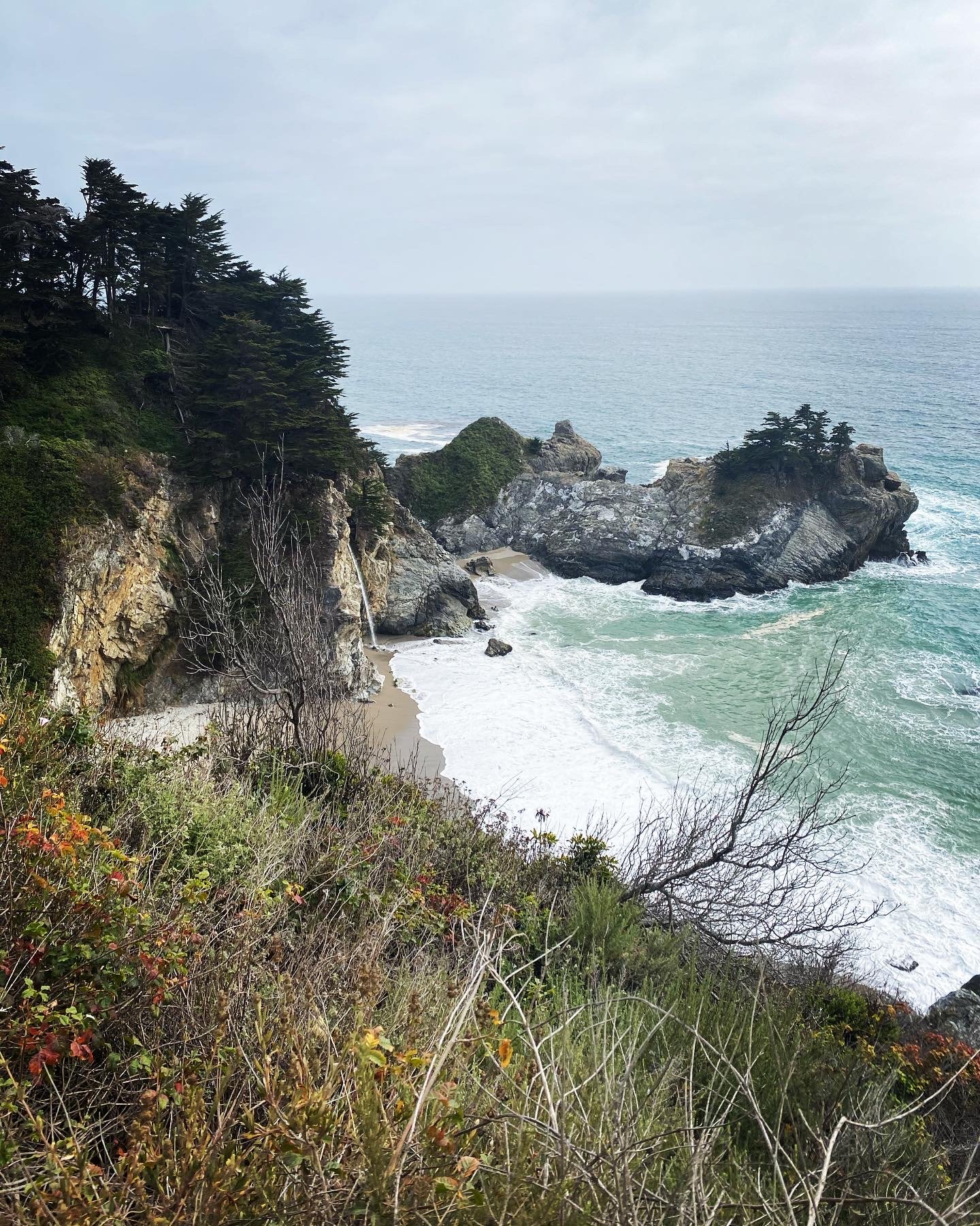 Ocean waves along the Big Sur coastline in California, often used as a calming visual in therapy spaces