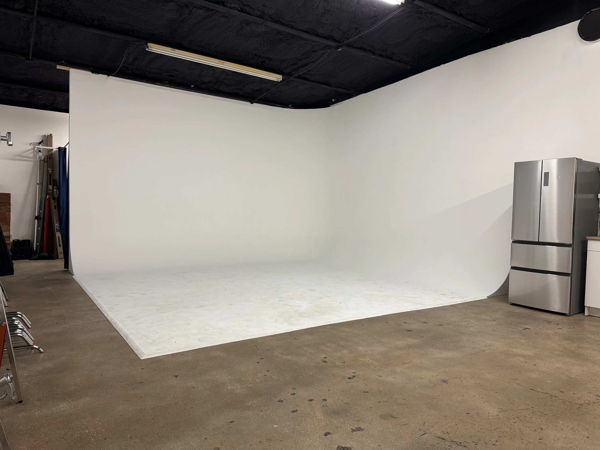 Large cyc wall in Austin photo studio.