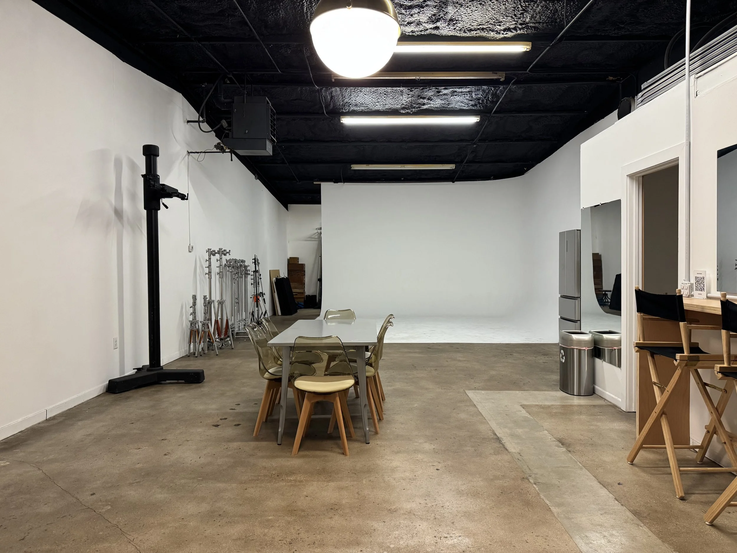Professional photo studio near downtown Austin with a large cyc wall.