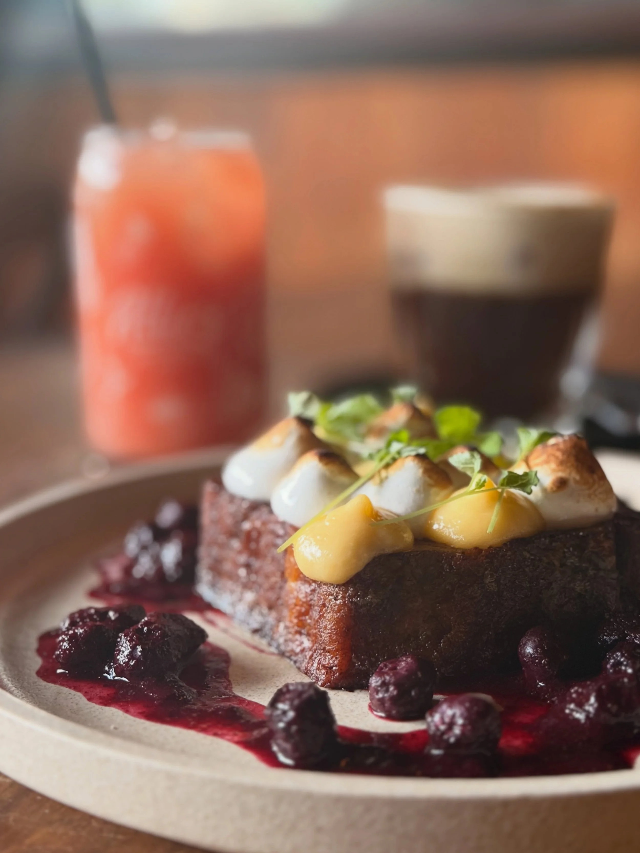 A special b&rsquo;fast special ✨&rdquo;Croissant&rdquo; French toast with lemon curd, scorched meringue, fermented blueberry sauce + lemon balm.