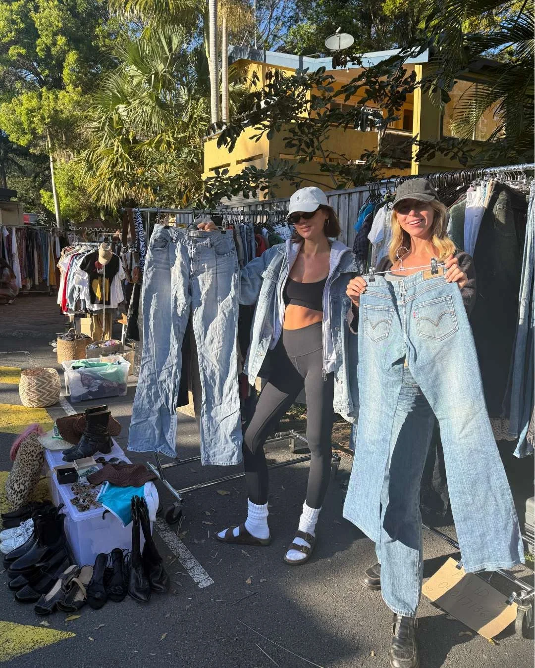 Two women selling clothes at Perk Up Byron Thrift Stall The Roadhouse