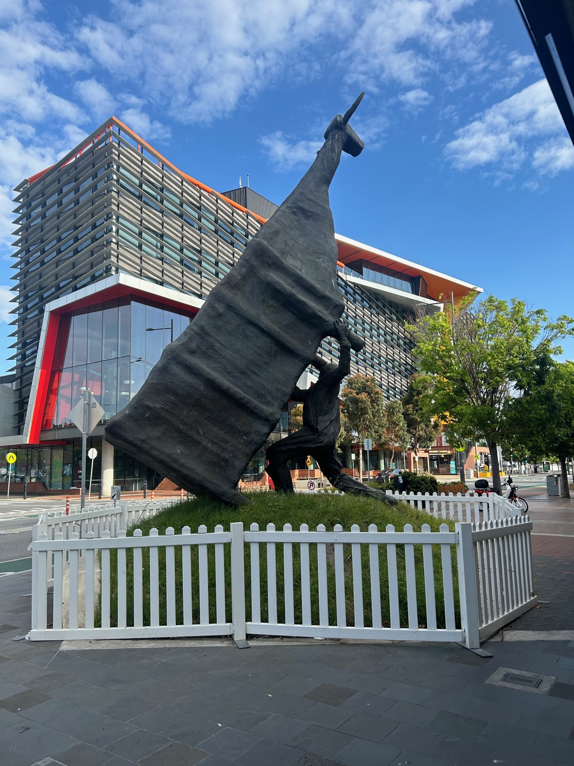 Man Lifting Cow by John Kelly