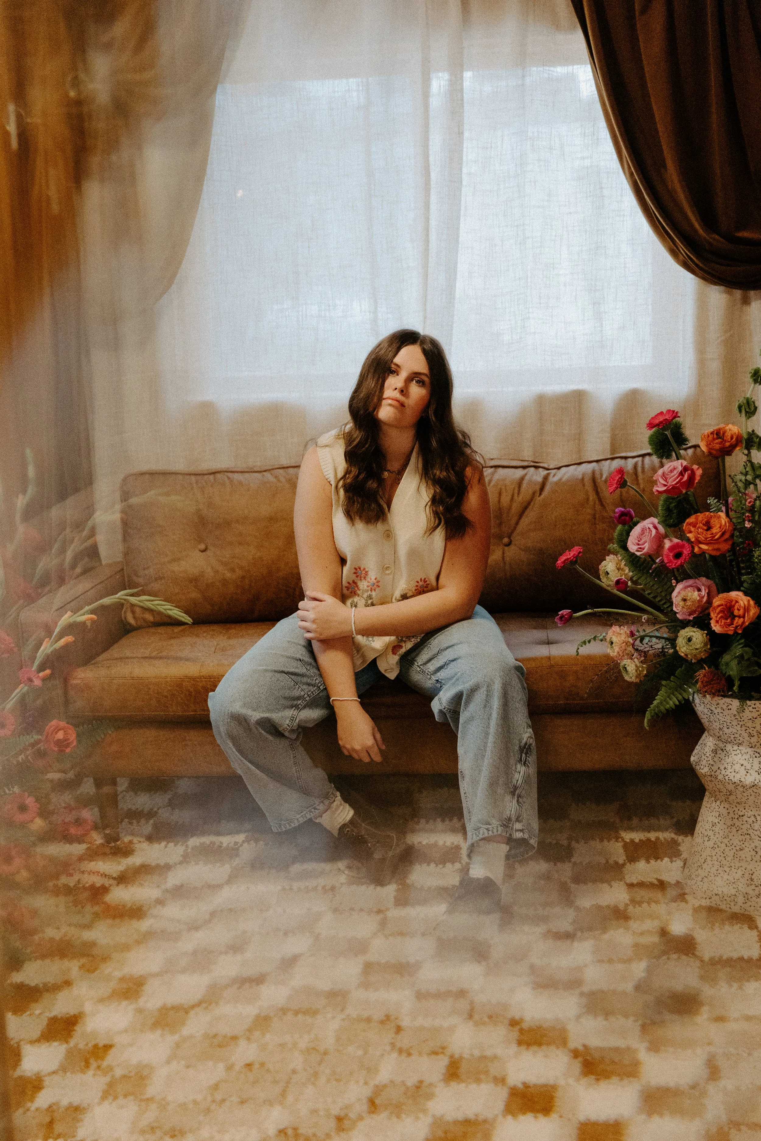 photographer morgan piazzola sitting on couch