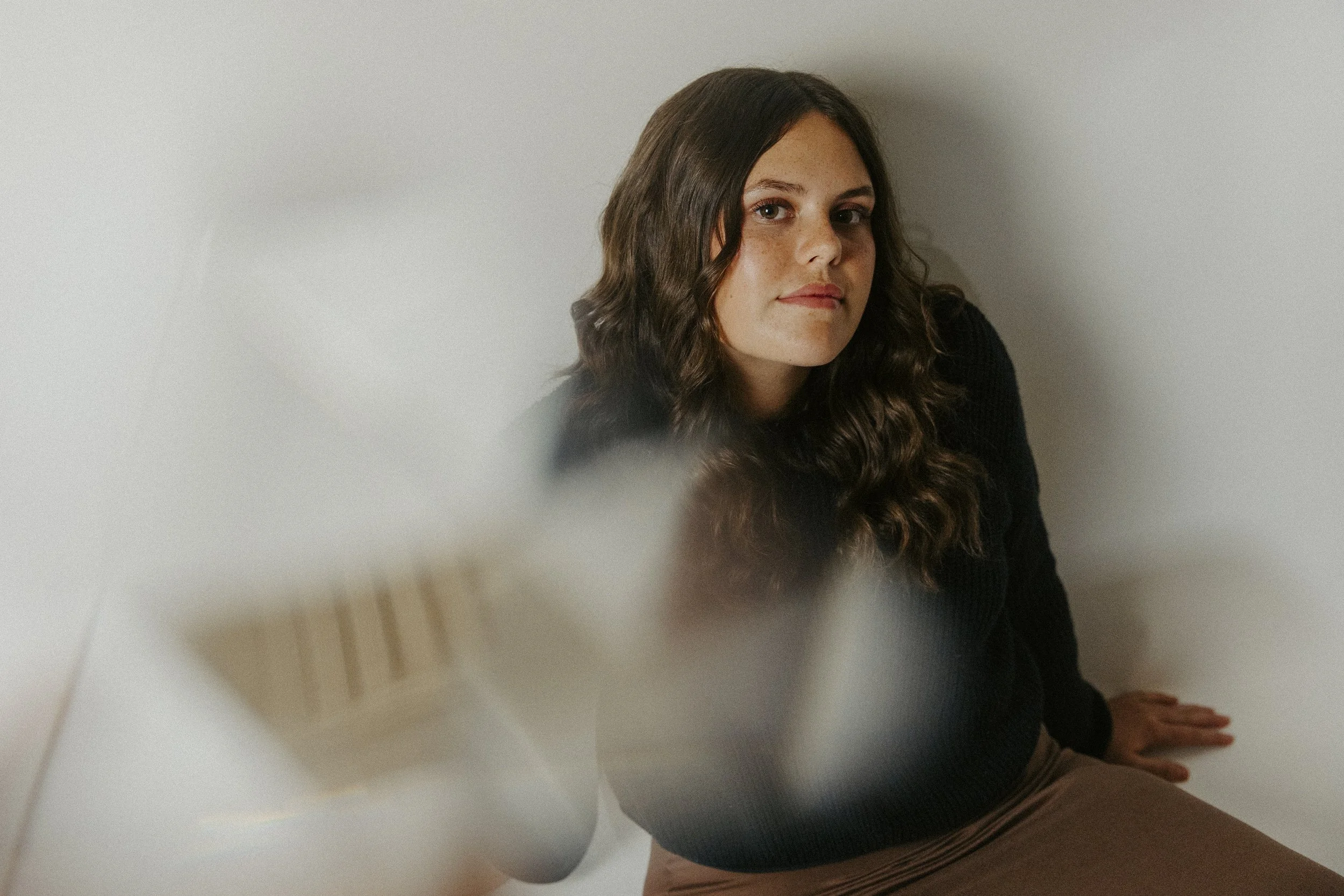 montana photographer morgan piazzola looking up at camera